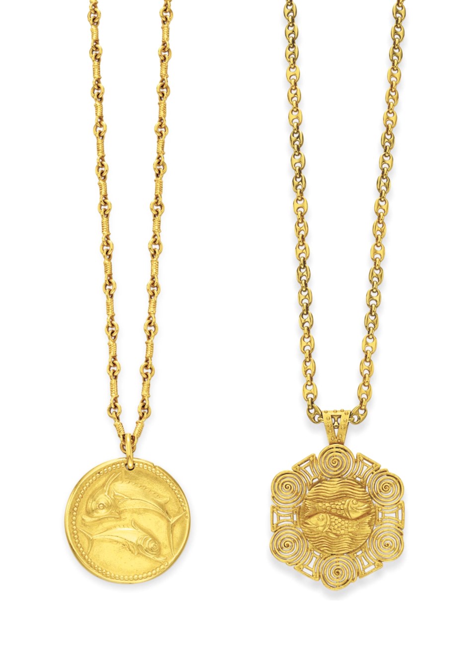 TWO GOLD ZODIAC PENDANTS, BY VAN CLEEF & ARPELS