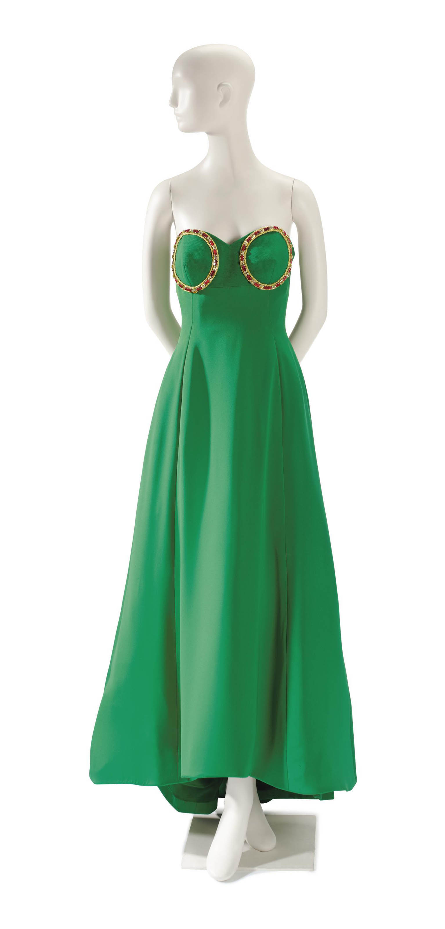 A VERSACE STRAPLESS EVENING GOWN OF EMERALD GREEN SILK , LABELED 'ATELIER  VERSACE', 1990S | Christie's