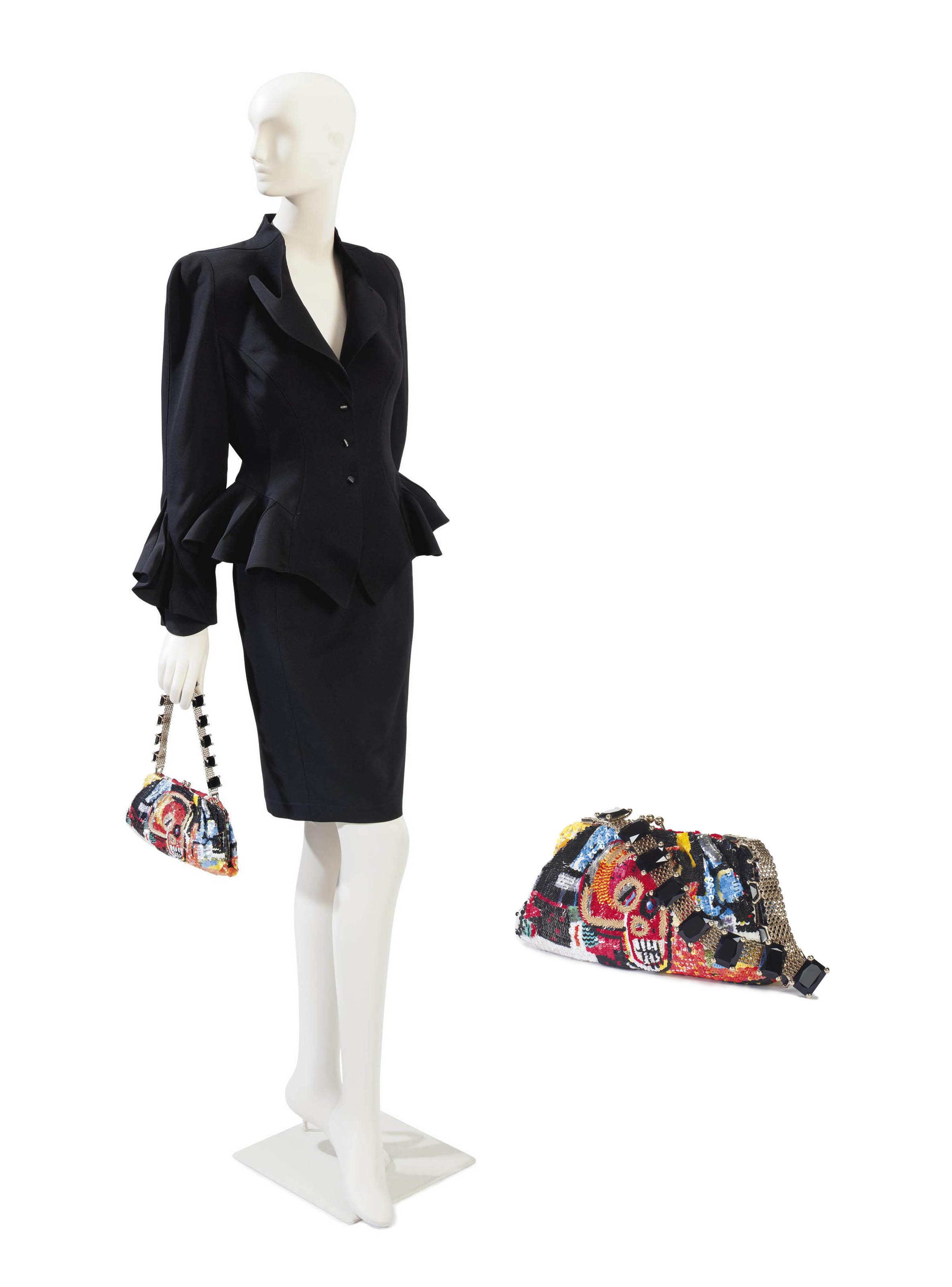 A THIERRY MUGLER BLACK WOOL SUIT AND A VALENTINO SEQUINNED HANDB
