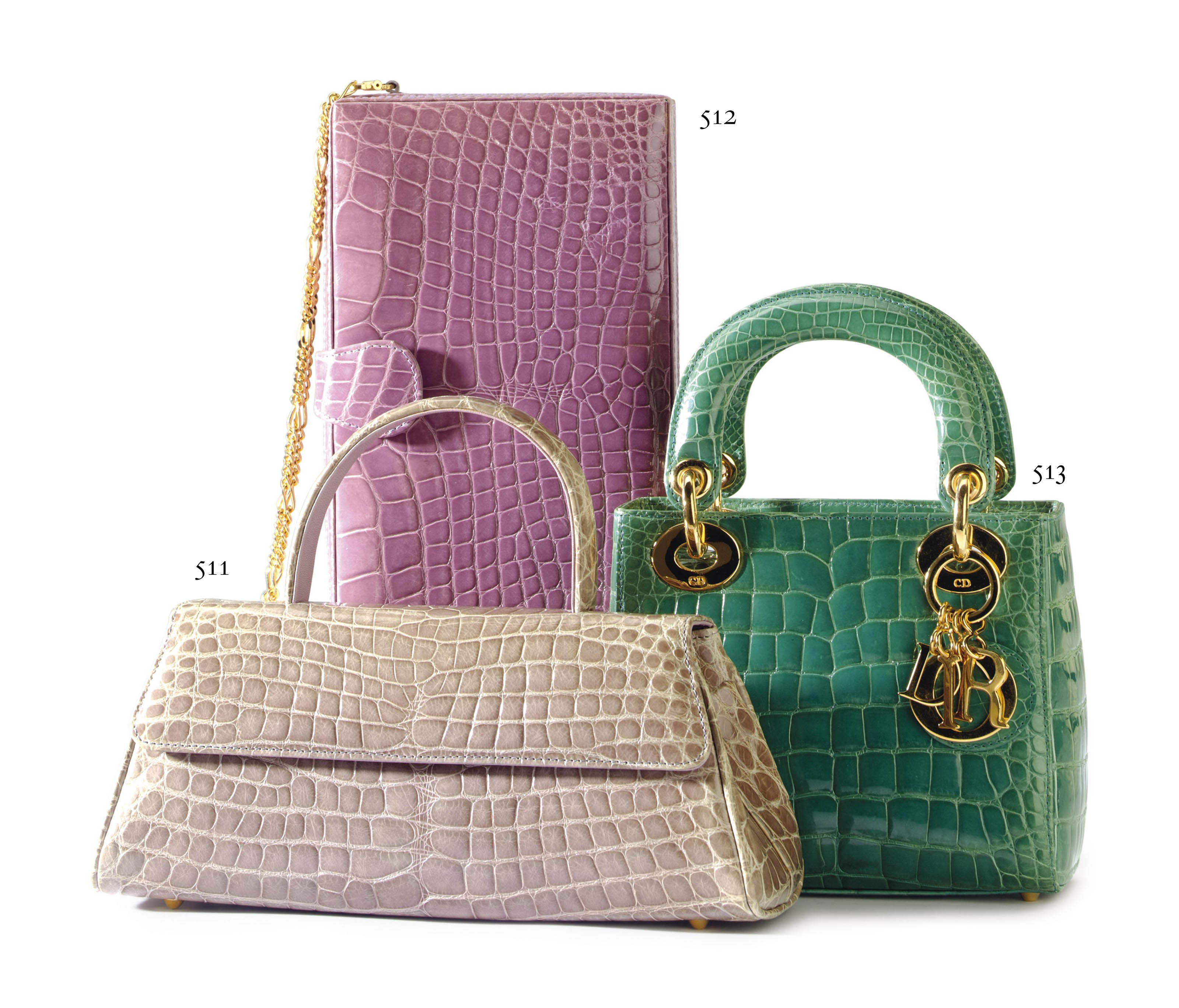 A LAVENDER GREY CROCODILE TRAPEZOID SHAPE BAG , LABELED GIANFRANCO FERRÉ, CIRCA 2001 | Christies A LAVENDER GREY CROCODILE... 