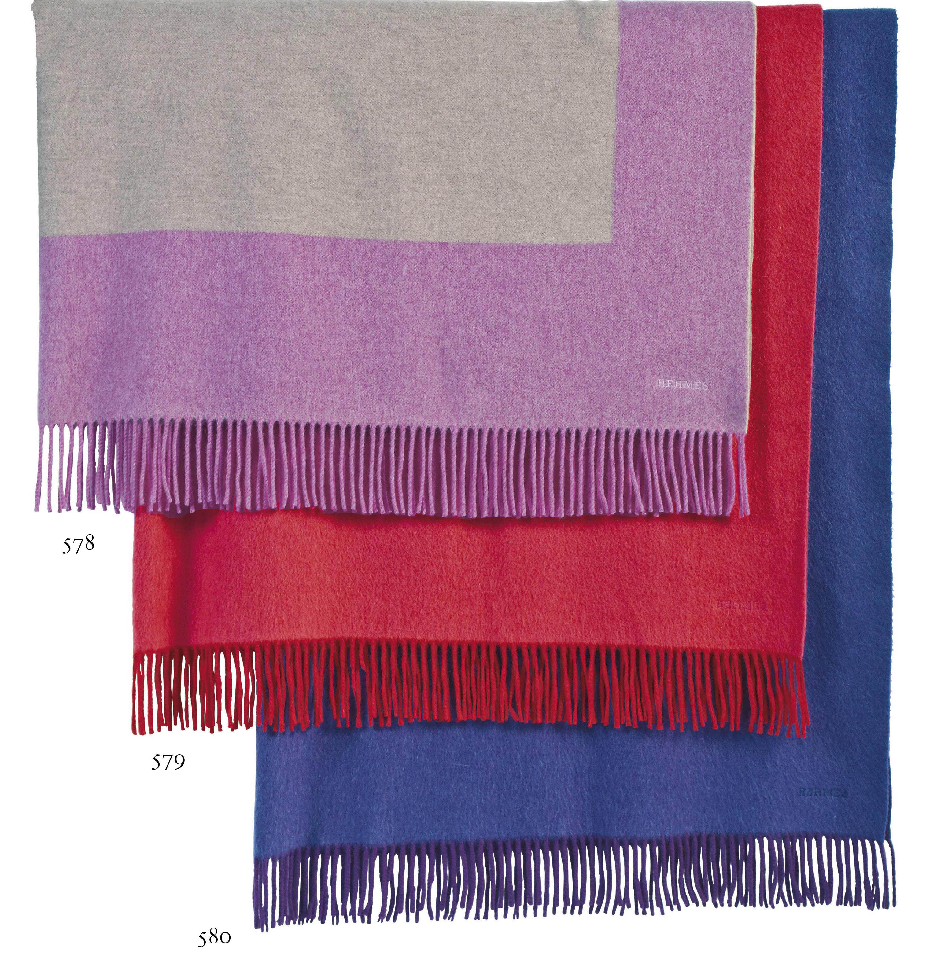 A PINK CASHMERE THROW OR CAR BLANKET , LABELED AND EMBROIDERED 'HERMÈS