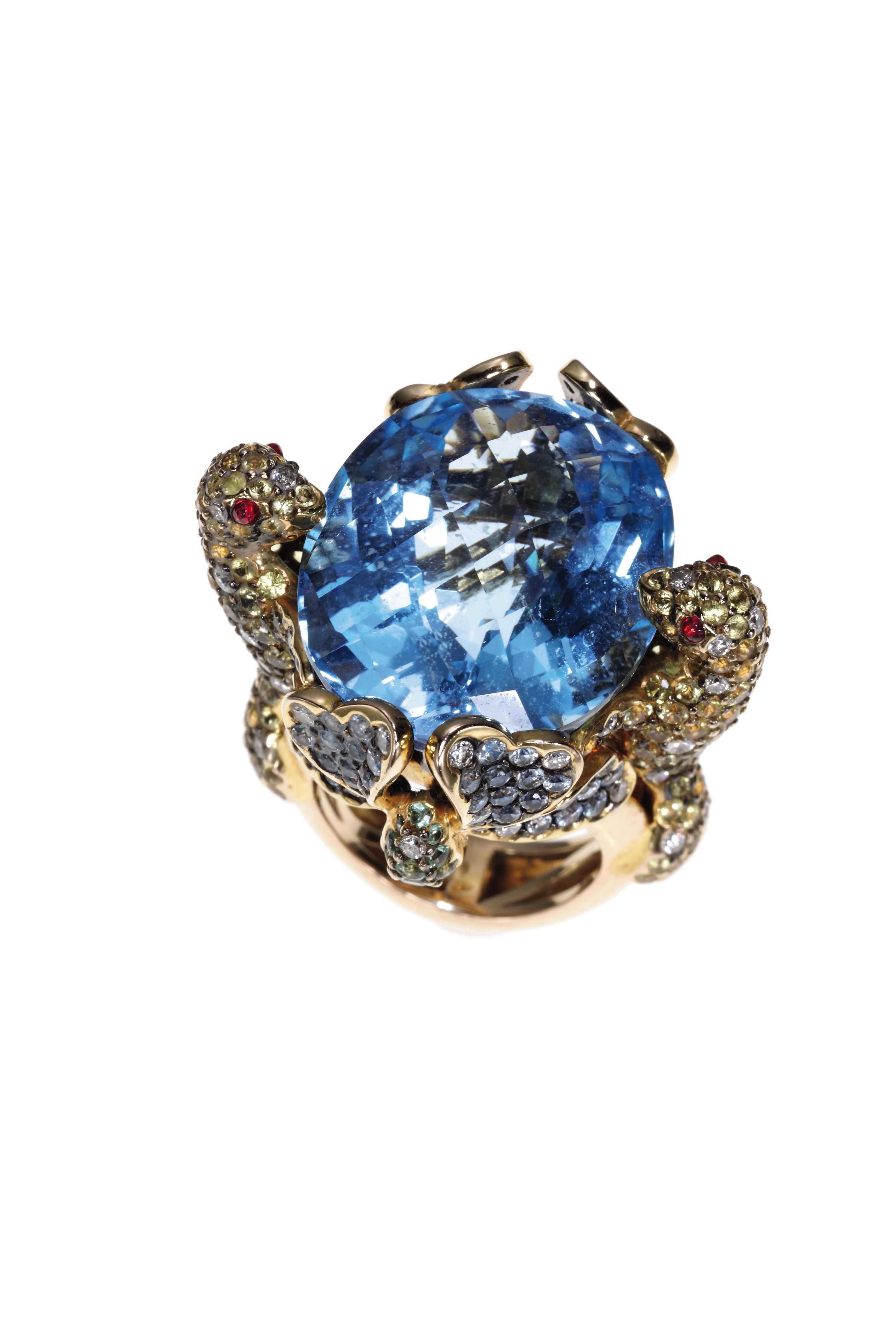 Peridot And Blue Sapphire Ring : A MULTI-COLORED GEMSTONE RING, BY ZORAB | Christie's : On the other end is a bright and lively blue sapphire that weighs 0.04 carats.