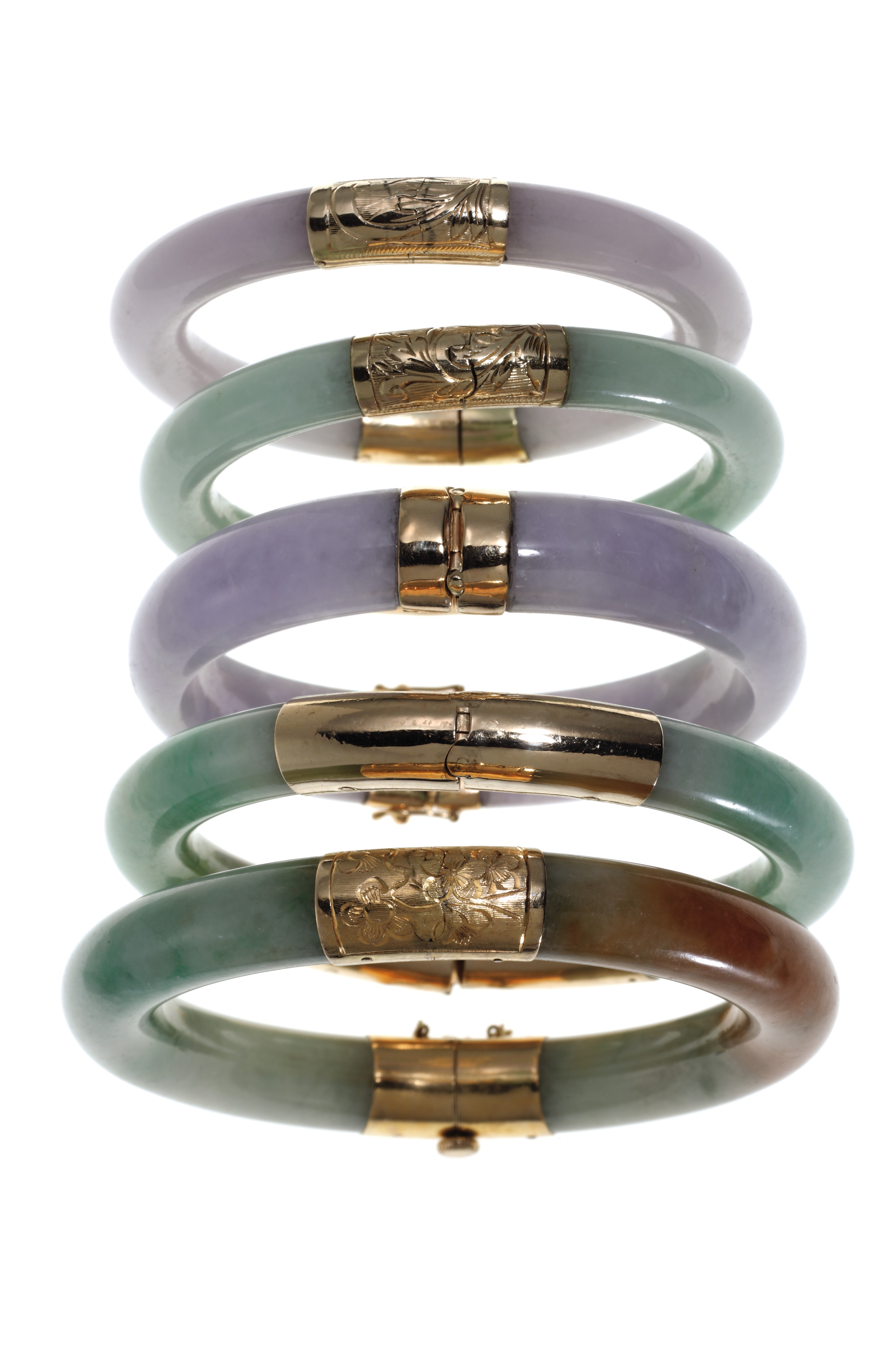FIVE JADE AND GOLD BANGLE BRACELETS Christie's