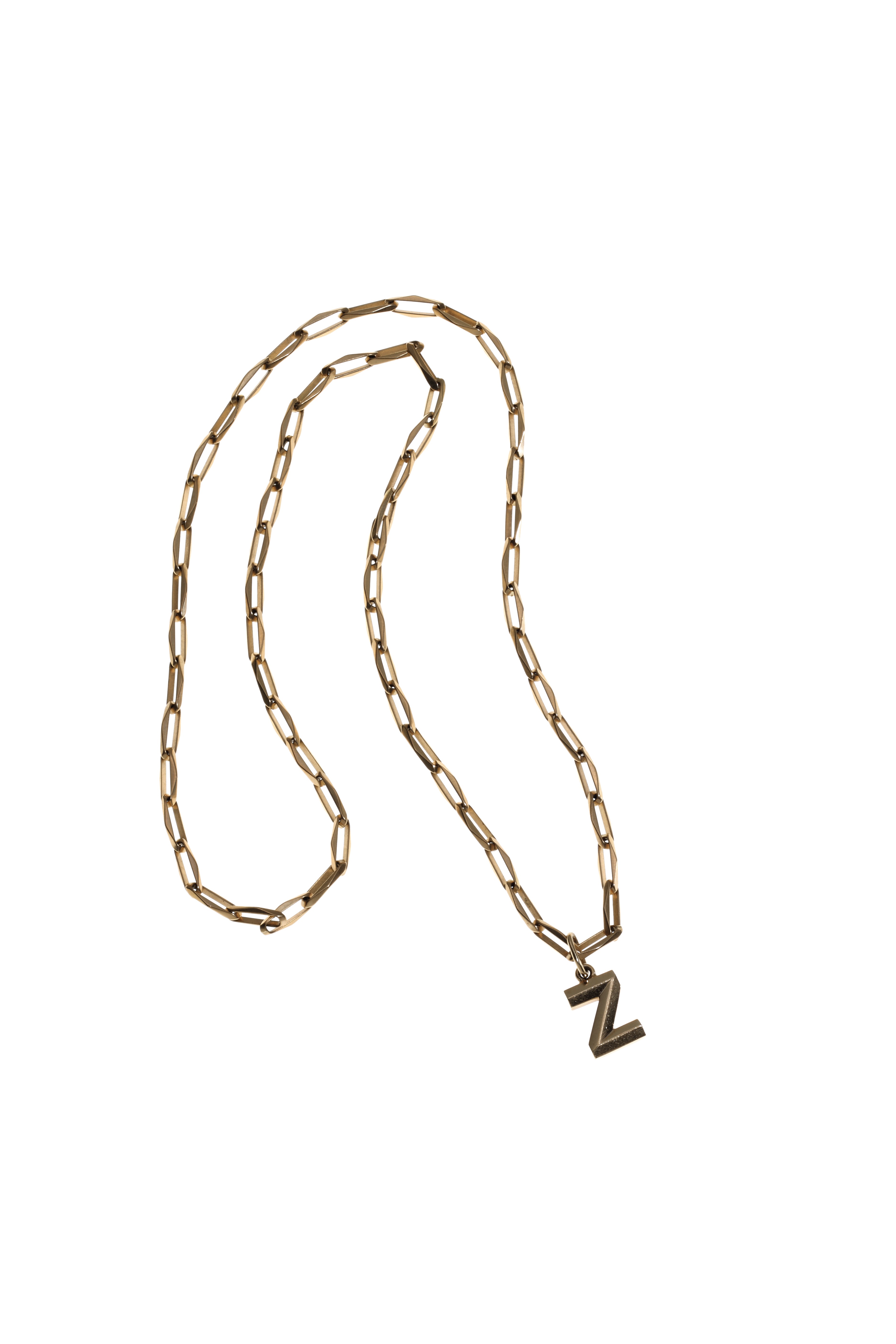 A GOLD 'Z' PENDANT NECKLACE Christie's