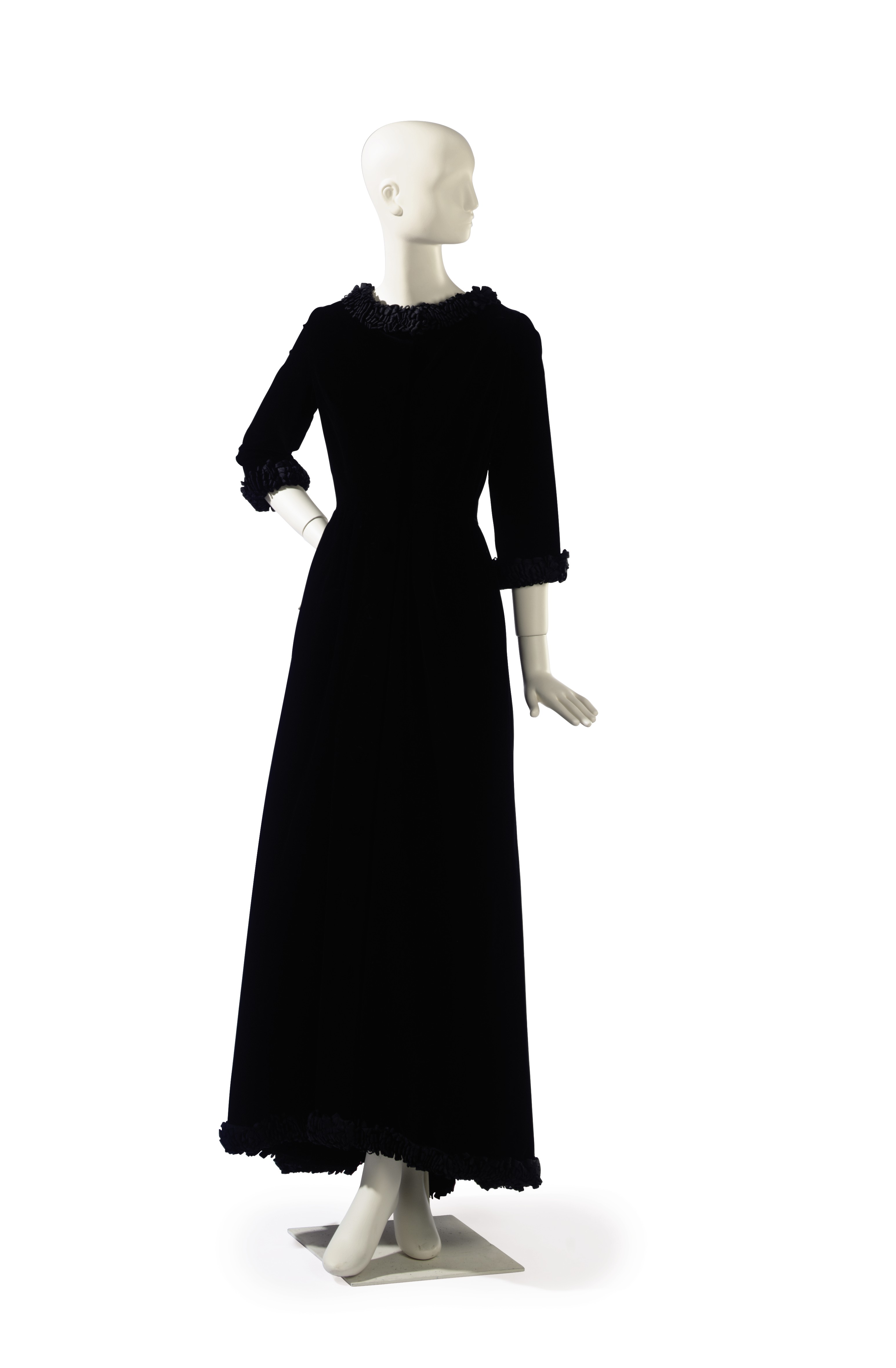 A CHRISTIAN DIOR BLACK VELVET AND RIBBON TRIMMED EVENING GOWN , LABELED