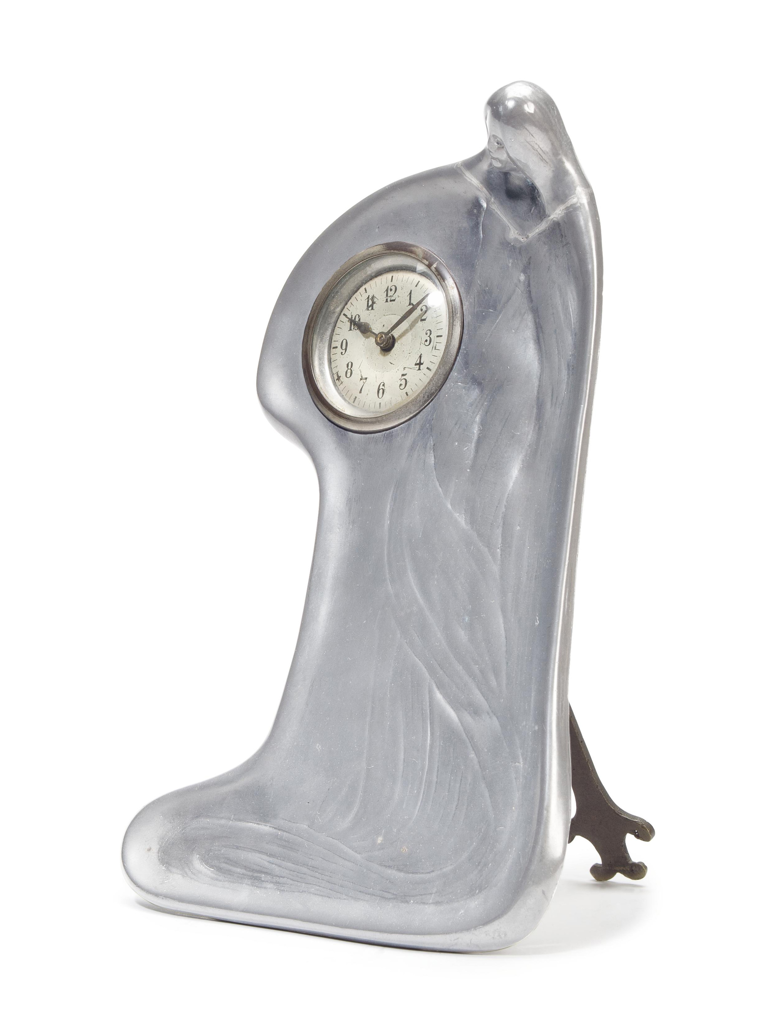 CONTINENTAL , AN ART NOUVEAU PEWTER FIGURAL TABLE CLOCK, CIRCA 1900