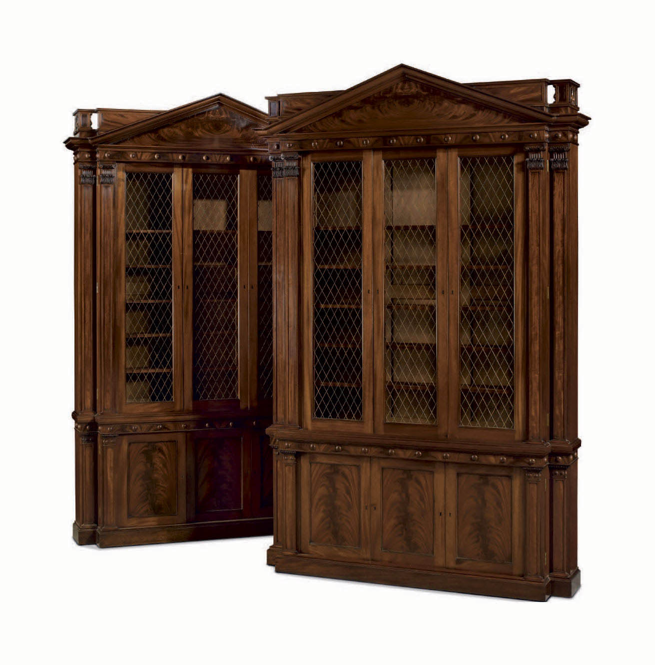 A PAIR OF ENGLISH MAHOGANY LIBRARY BOOKCASES