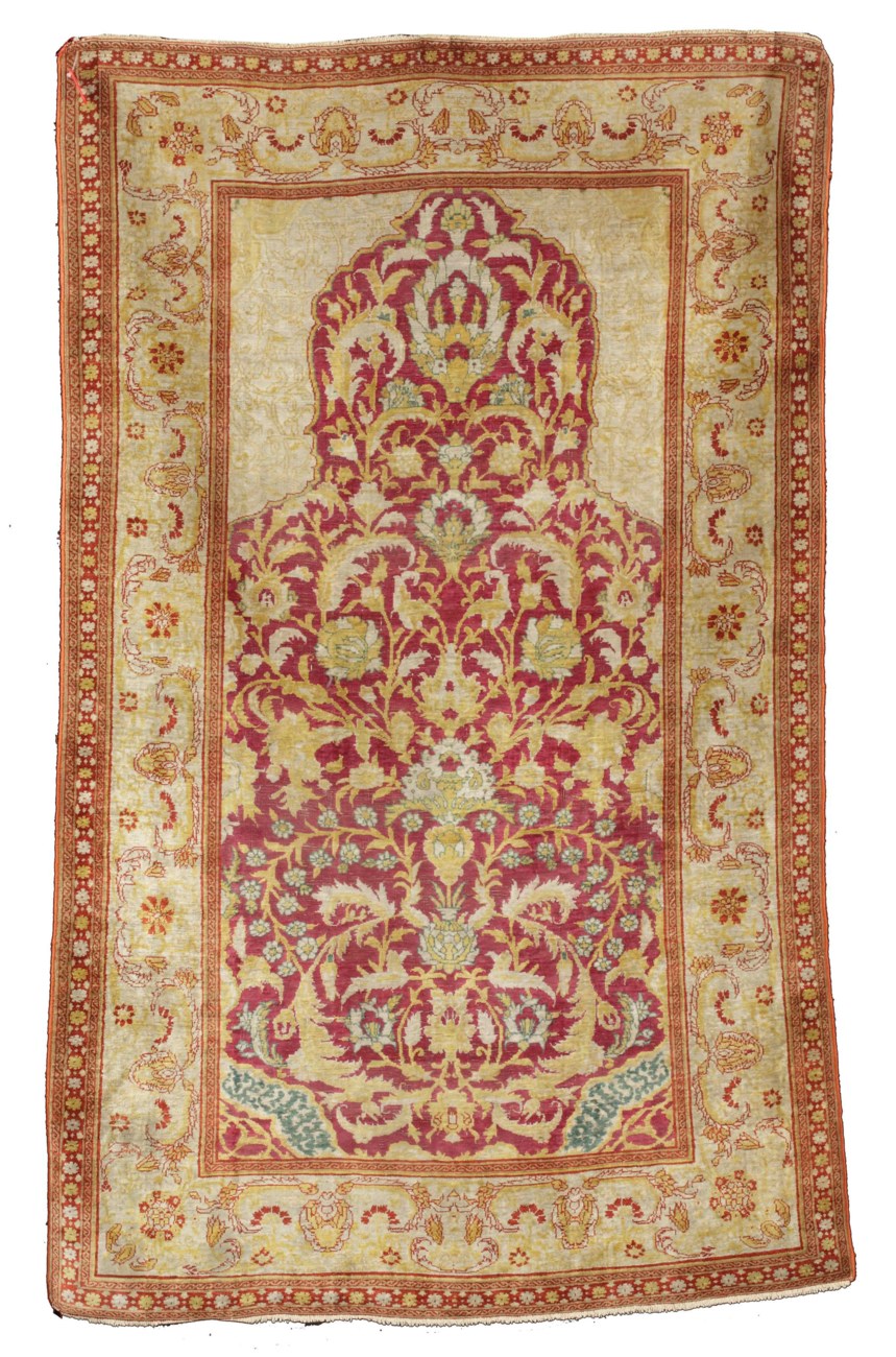 A TURKISH SILK PRAYER RUG , POSSIBLY HEREKE, EARLY 20TH CENTURY Christie's