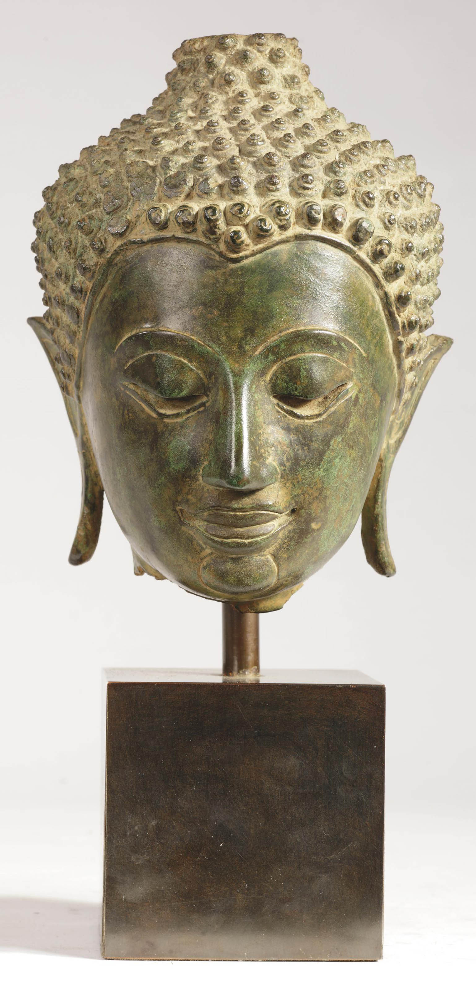 A Thai bronze head of Buddha , 17TH CENTURY Christie's