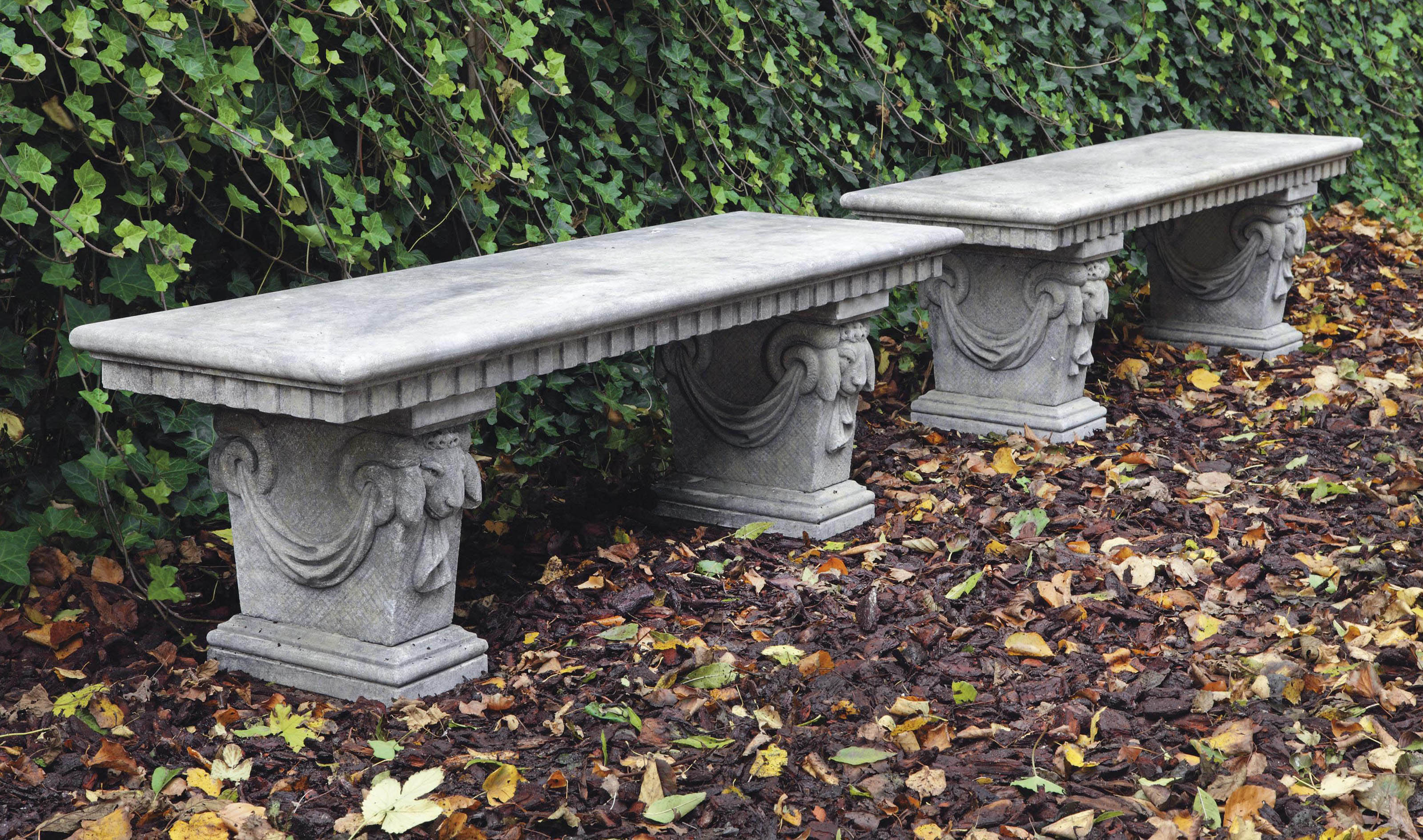 A pair of carved limestone garden benches Christie's