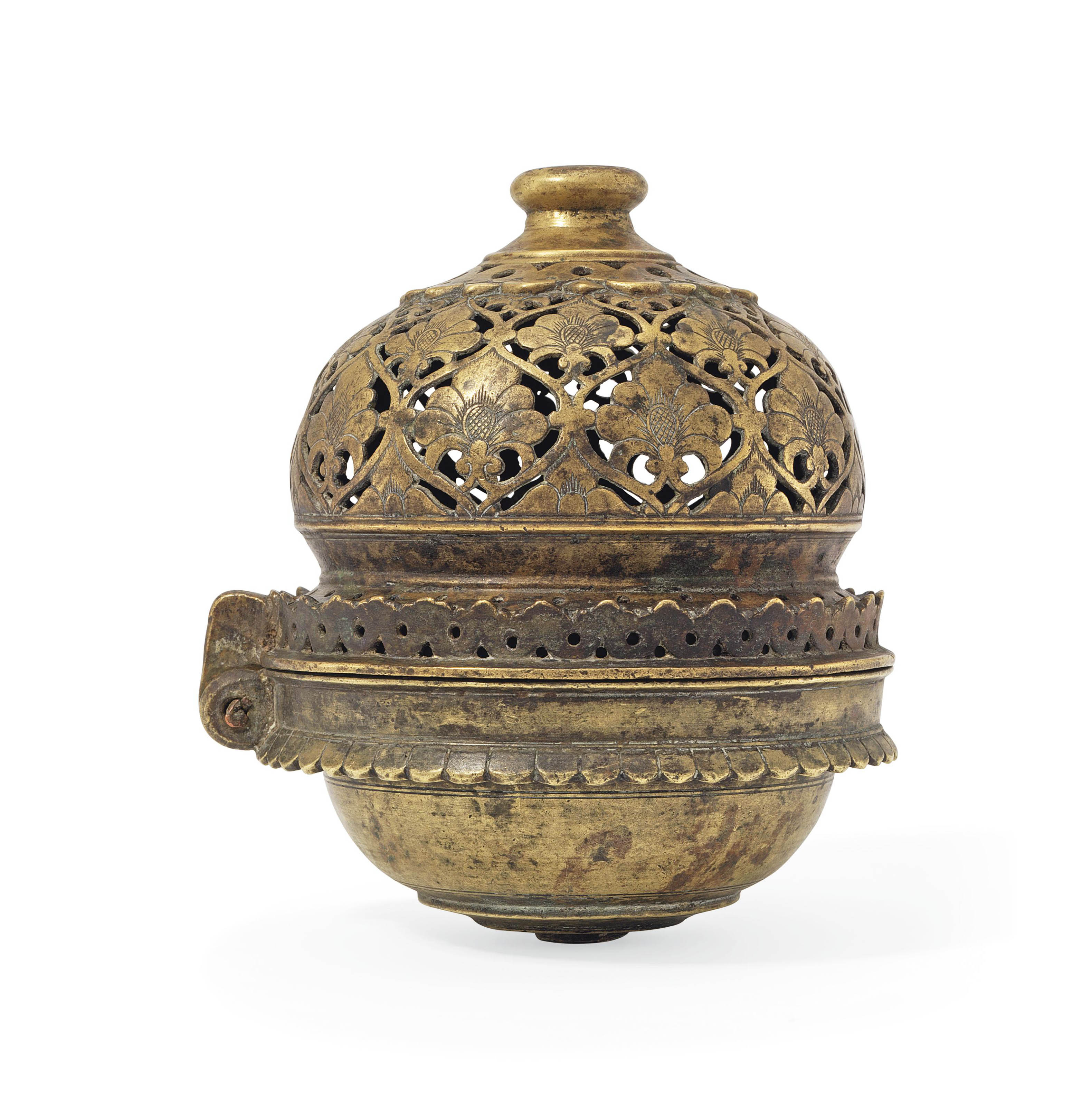 A DECCANI PIERCED BRASS INCENSE BURNER , CENTRAL INDIA, 17TH CENTURY