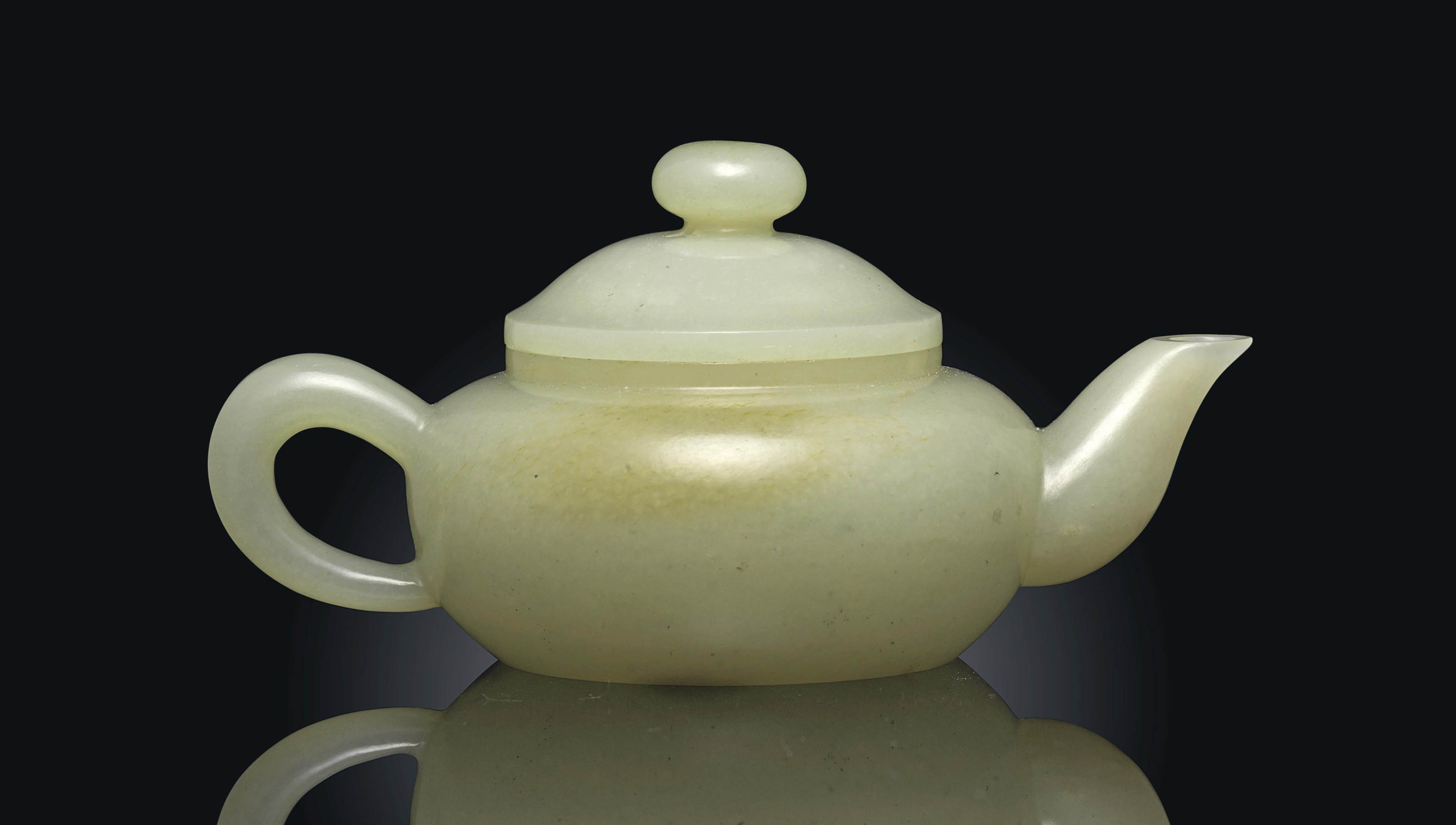 A PALE CELADON JADE TEAPOT AND COVER , 19TH CENTURY Christie's