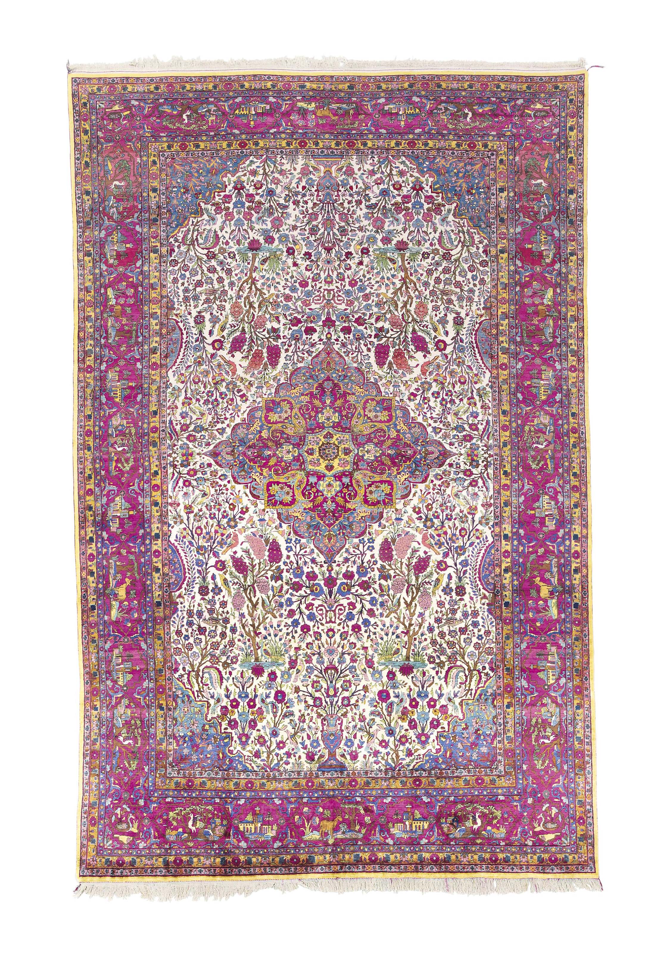 A SILK KASHAN CARPET