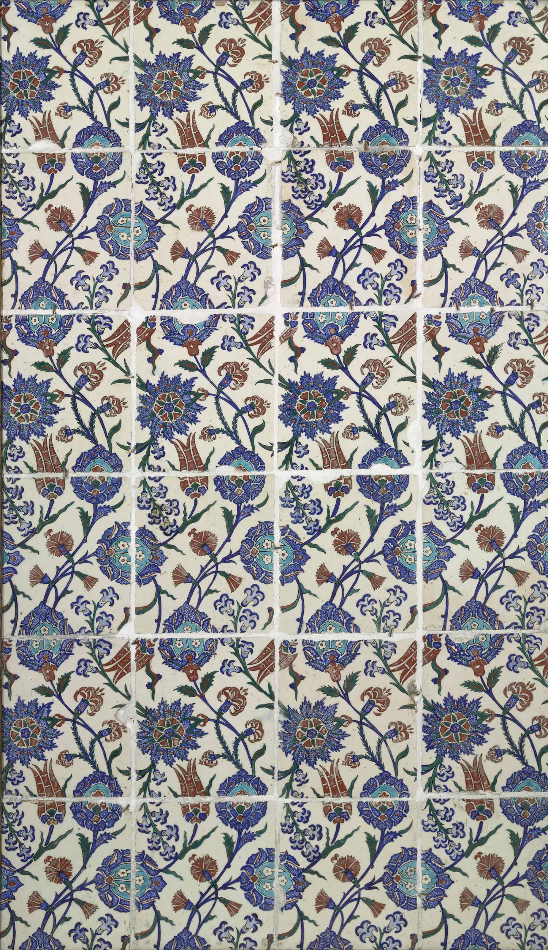 AN IZNIKSTYLE POTTERY TILE PANEL