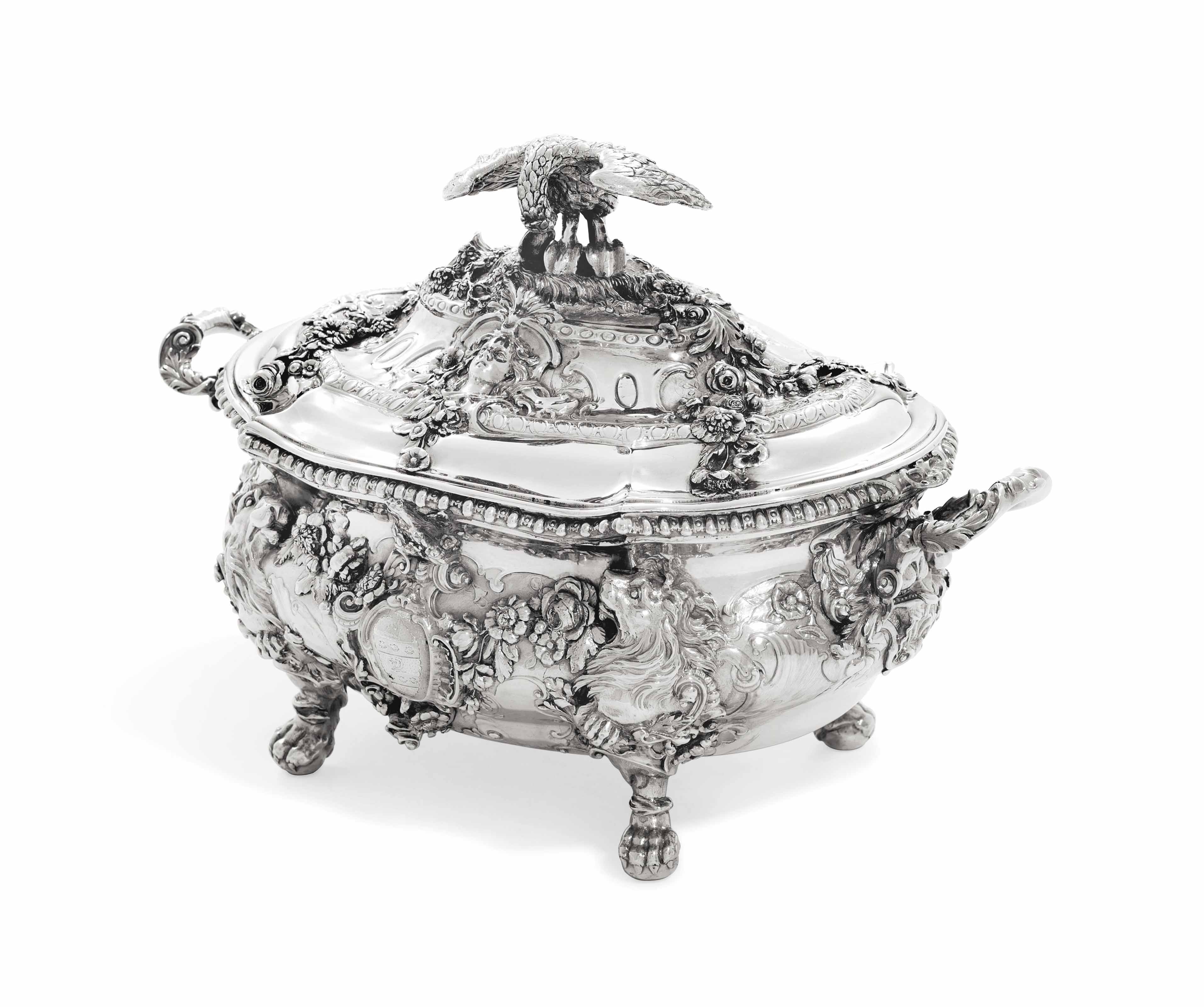 A George II silver soup-tureen and cover, mark of Paul de Lamerie, London, 1747, the cast crest is that of Jodrell, almost certainly for Gilbert Jodrell (c.1714-1772), the second son of Paul Jodrell esq., of Duffield, Derbyshire.&nbsp;17in (43.2  cm) wide. Sold for &pound;241,250 on 27-28 November 2012 at Christie&rsquo;s in London