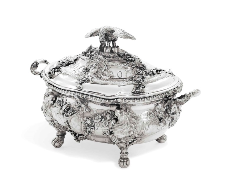 A George II silver soup-tureen and cover, mark of Paul de Lamerie, London, 1747, the cast crest is that of Jodrell, almost certainly for Gilbert Jodrell (c.1714-1772), the second son of Paul Jodrell esq., of Duffield, Derbyshire. 17in (43.2  cm) wide. Sold for £241,250 on 27-28 November 2012 at Christie’s in London