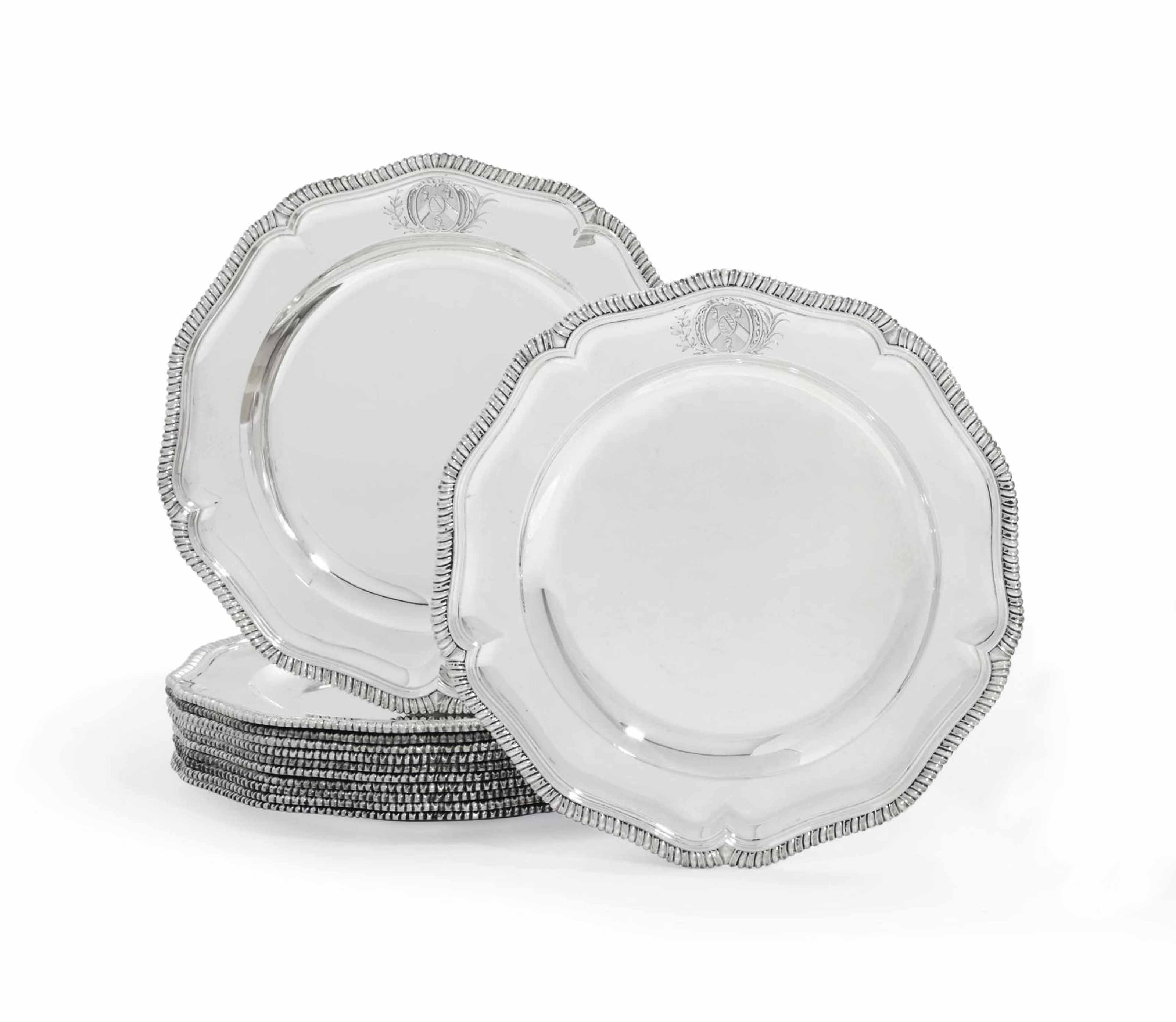 A SET OF TWELVE II SILVER DINNERPLATES