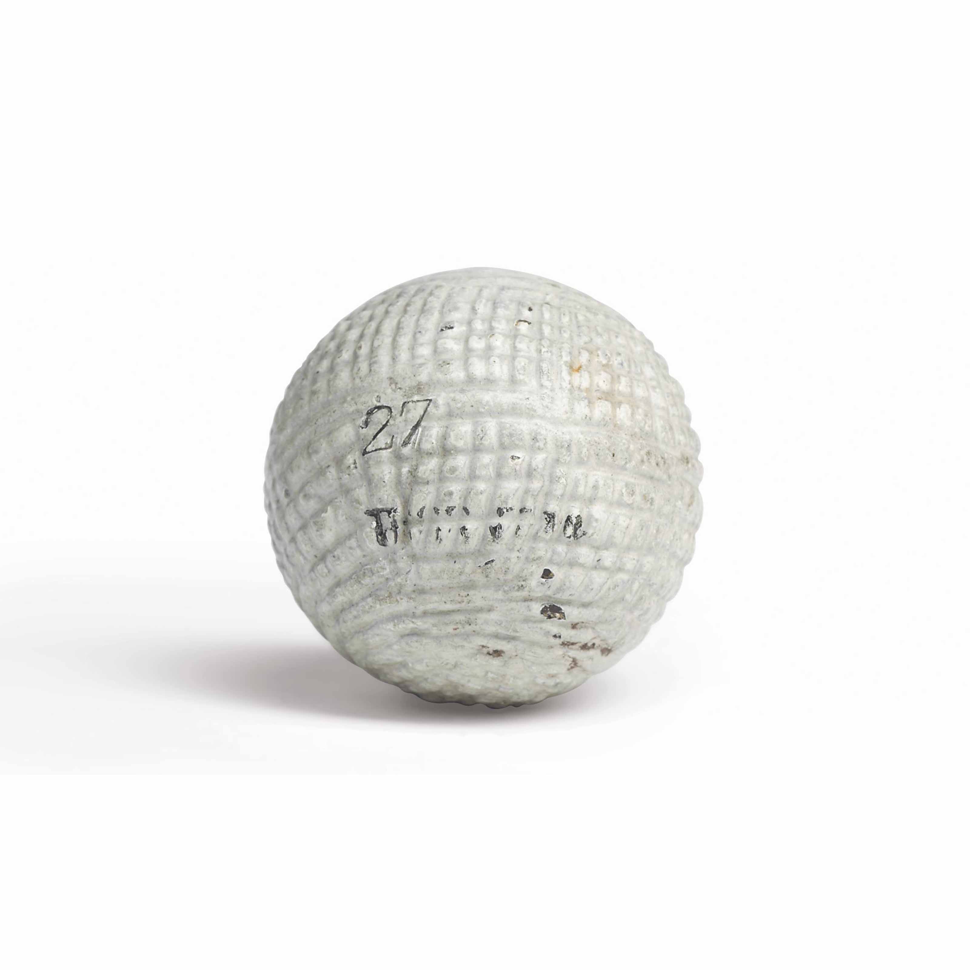 A HANDHAMMERED GUTTY GOLF BALL , BY TOM MORRIS, CIRCA 1850 Christie's