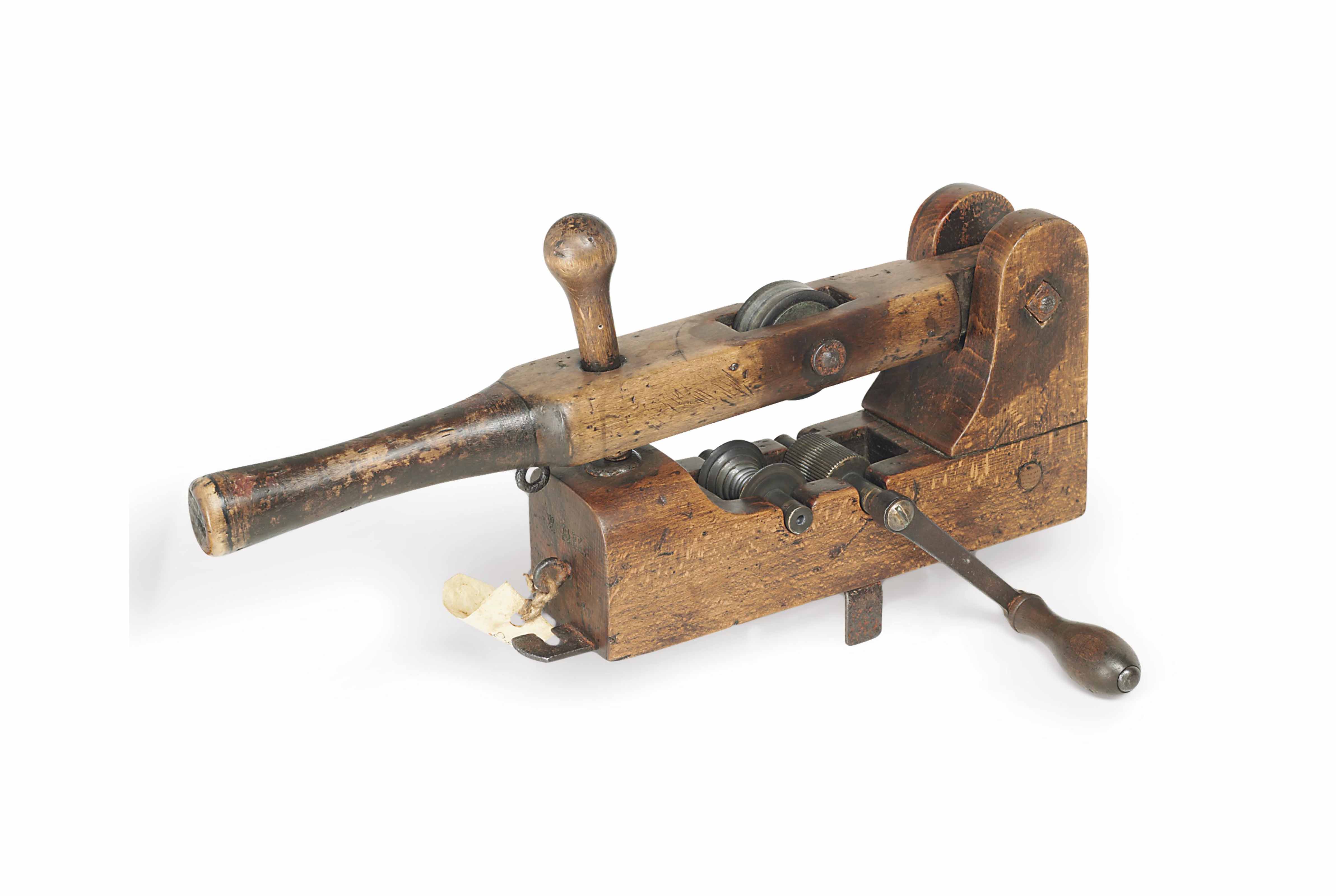 A FINE AND RARE BEECHWOOD GUTTAPERCHA GOLF BALL MARKING MACHINE OWNED