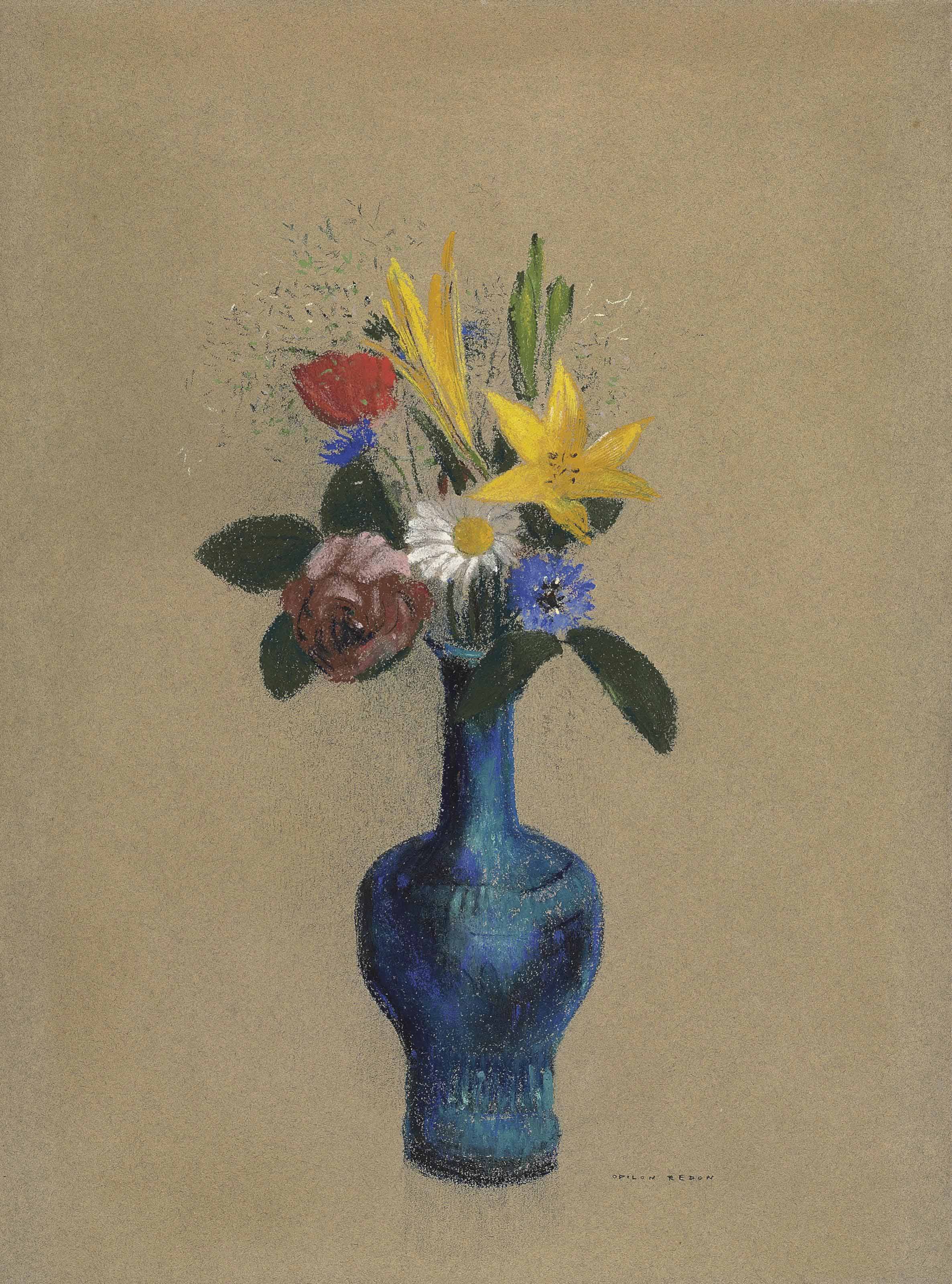 Bouquet de fleurs dans un vase bleu 
