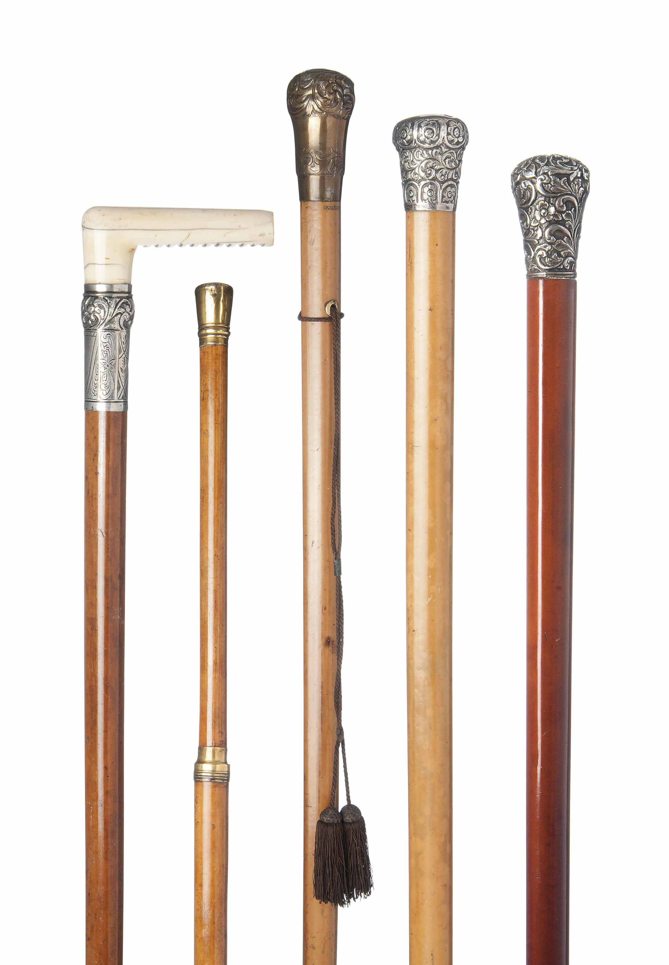 A COLLECTION OF FIVE VARIOUS CARVED MALACCA WALKING STICKS , LATE 19TH EARLY 20TH CENTURY