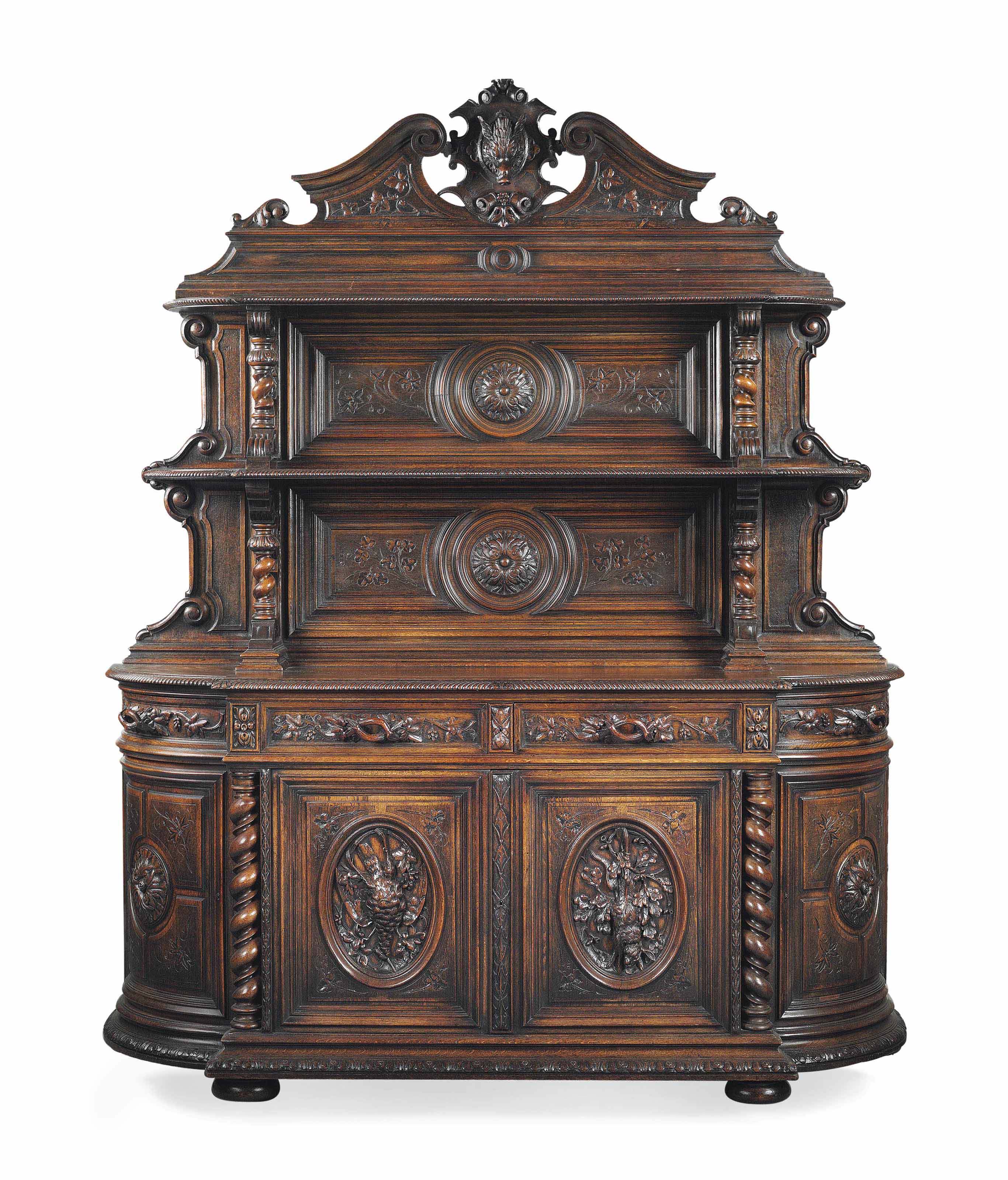 A VICTORIAN CARVED OAK SIDEBOARD OR BUFFET , BY WILKINSON, LAST QUARTER