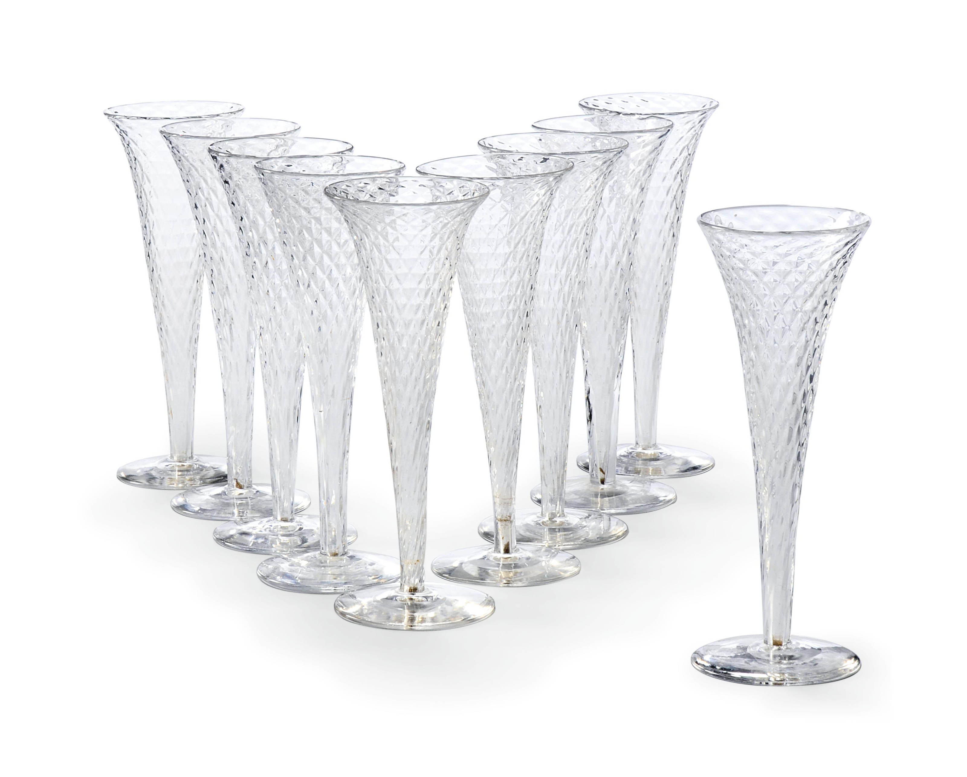 TEN GLASS CHAMPAGNE FLUTES , 20TH CENTURY Christie's