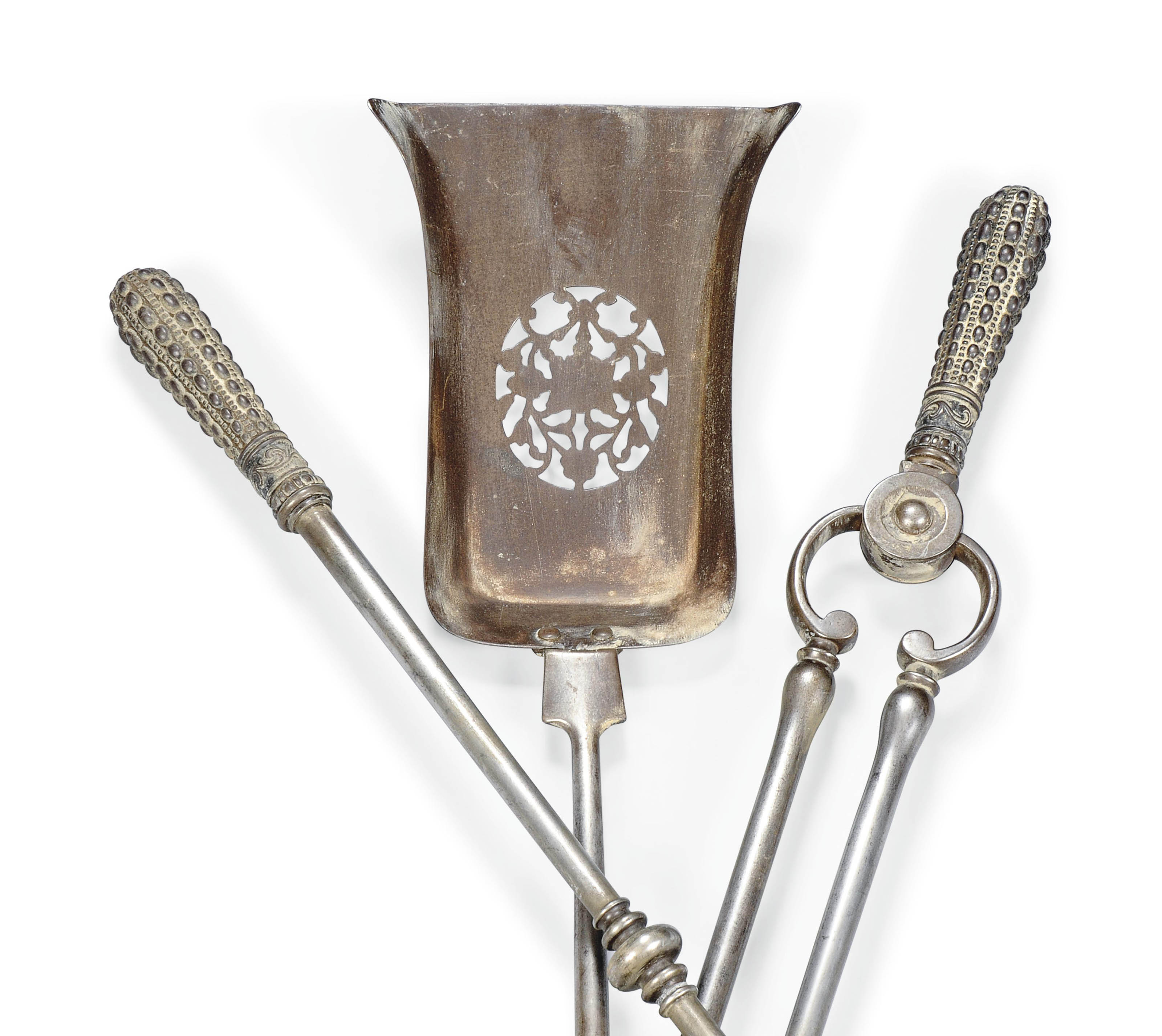 A SET OF THREE ENGLISH STEEL FIREIRONS , MID19TH CENTURY Christie's