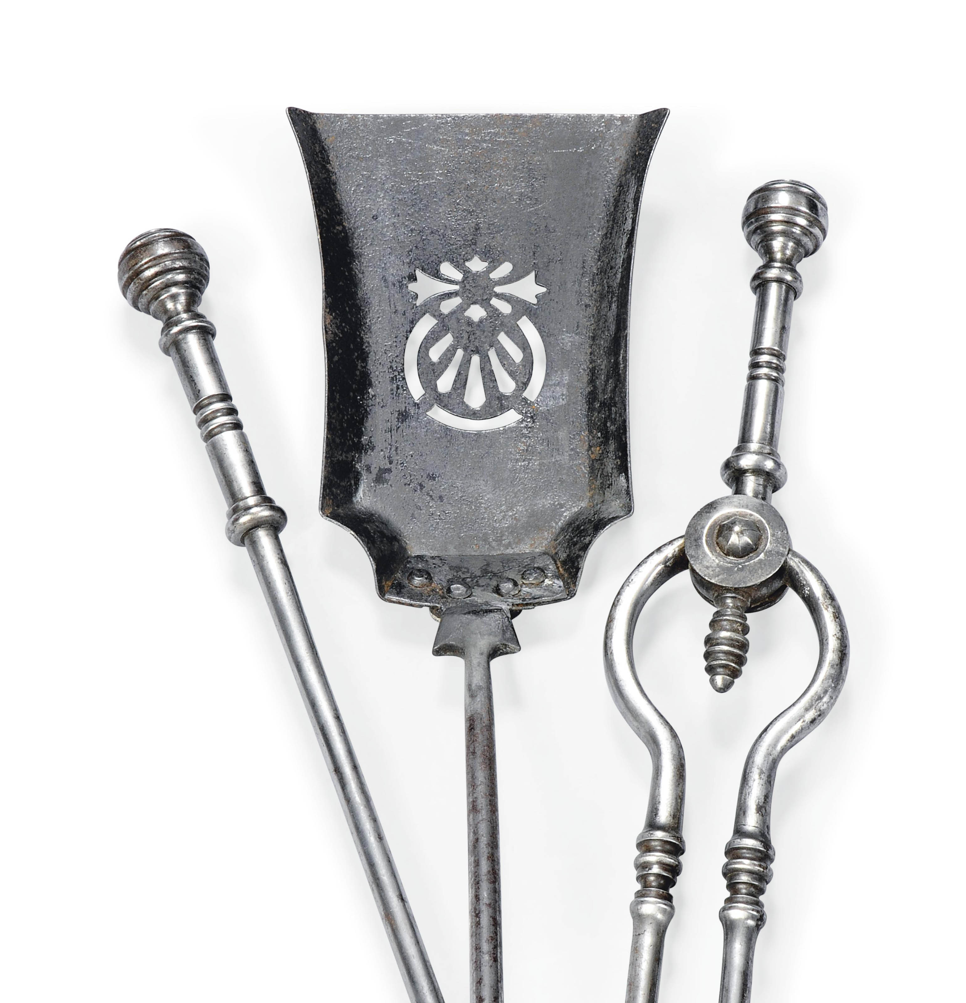 A SET OF THREE ENGLISH STEEL FIREIRONS , FIRST HALF 19TH CENTURY