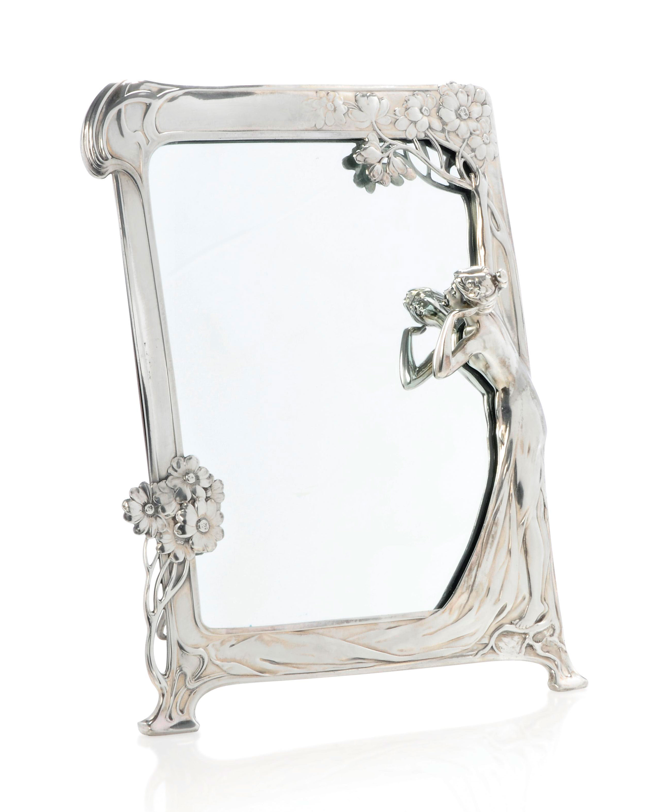 A WMF ART NOUVEAU POLISHED METAL FIGURAL EASEL MIRROR