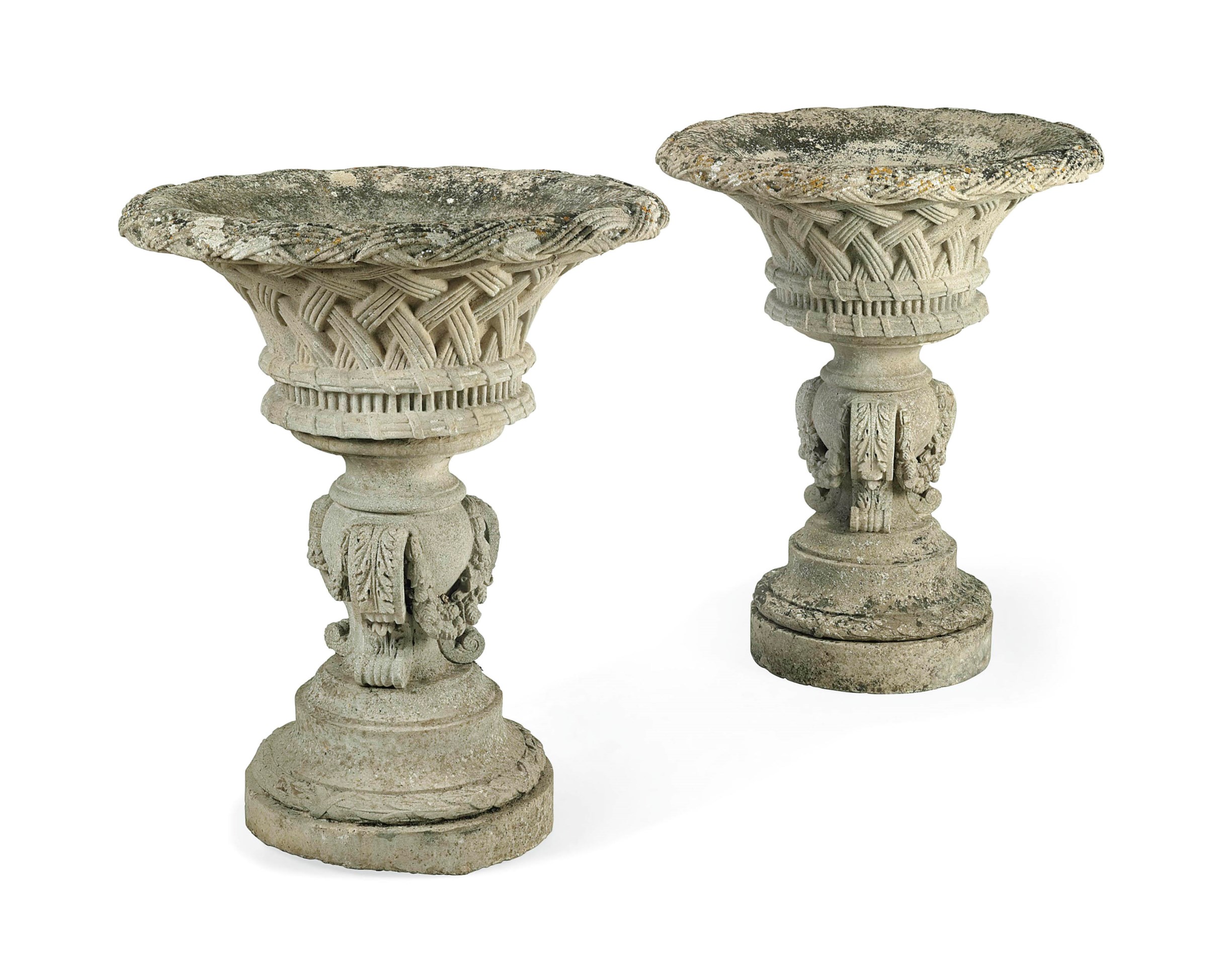 A LARGE PAIR OF COMPOSITION STONE GARDEN URNS AND PEDESTALS