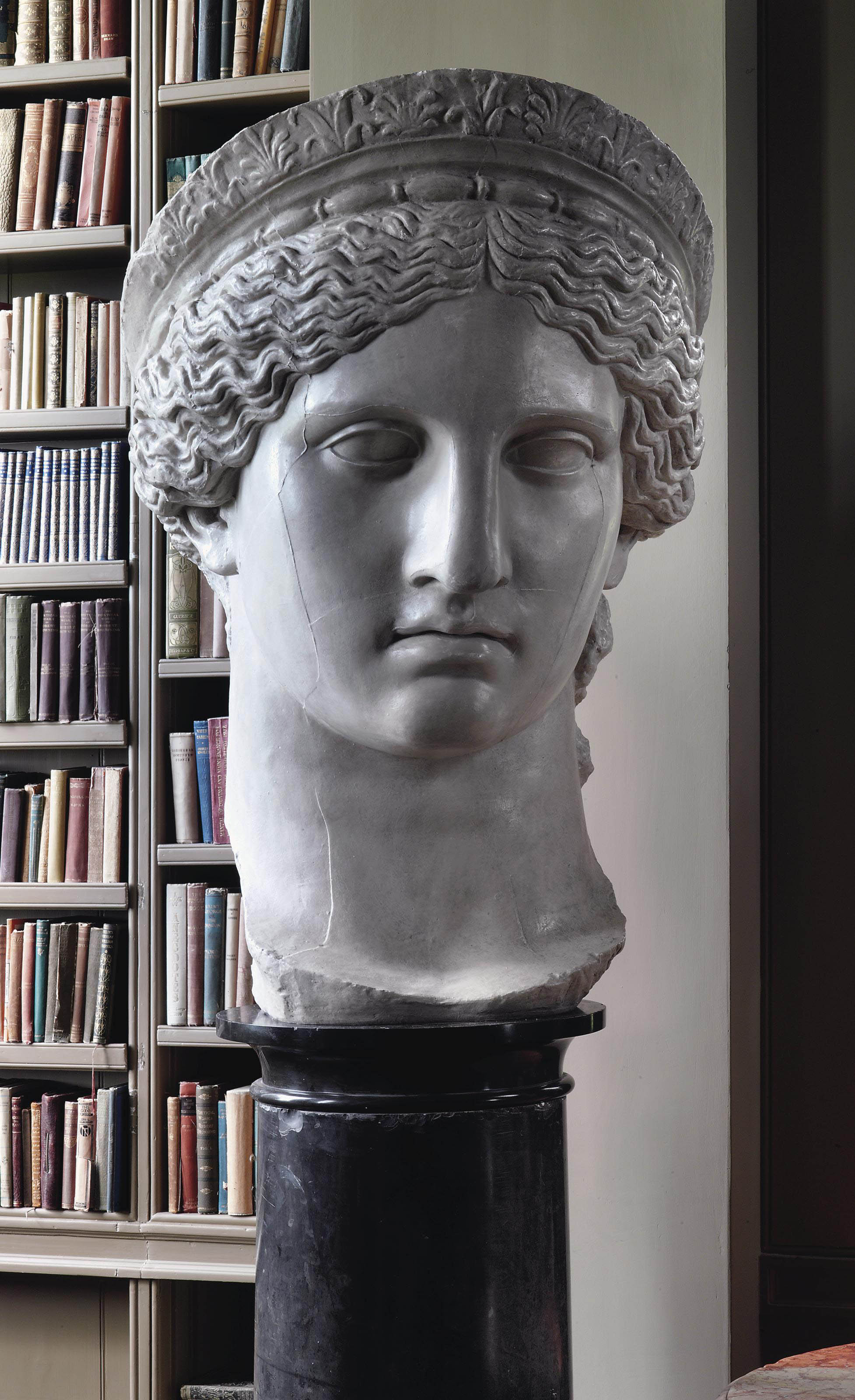 A PLASTER CAST OF THE MONUMENTAL FACE OF THE LUDOVISI JUNO, ON A