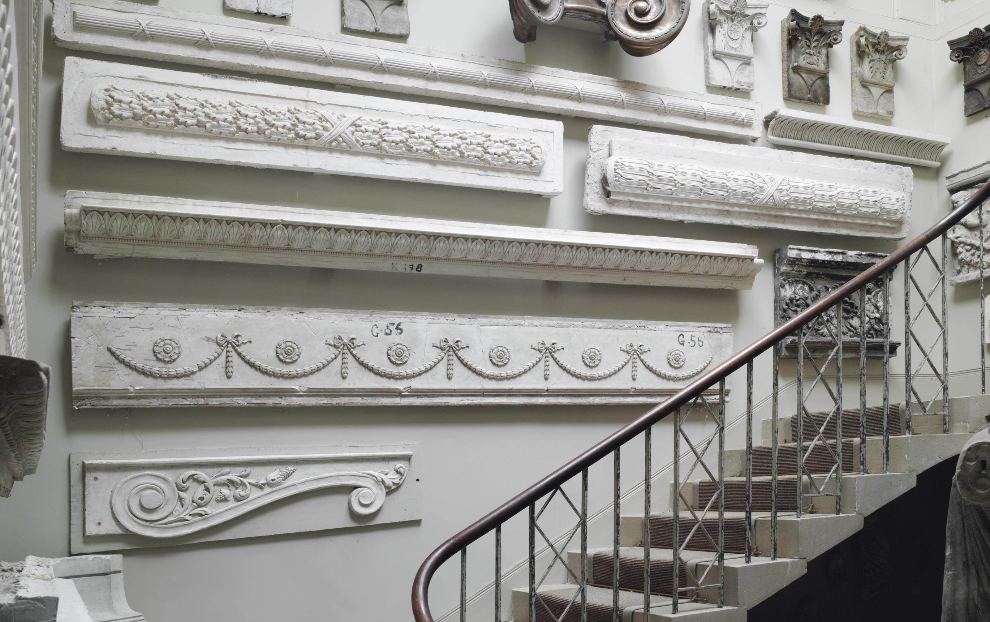 A COLLECTION OF SEVEN PLASTER FRIEZE MOULDINGS , THE 'MASTERS' POSSIBLY