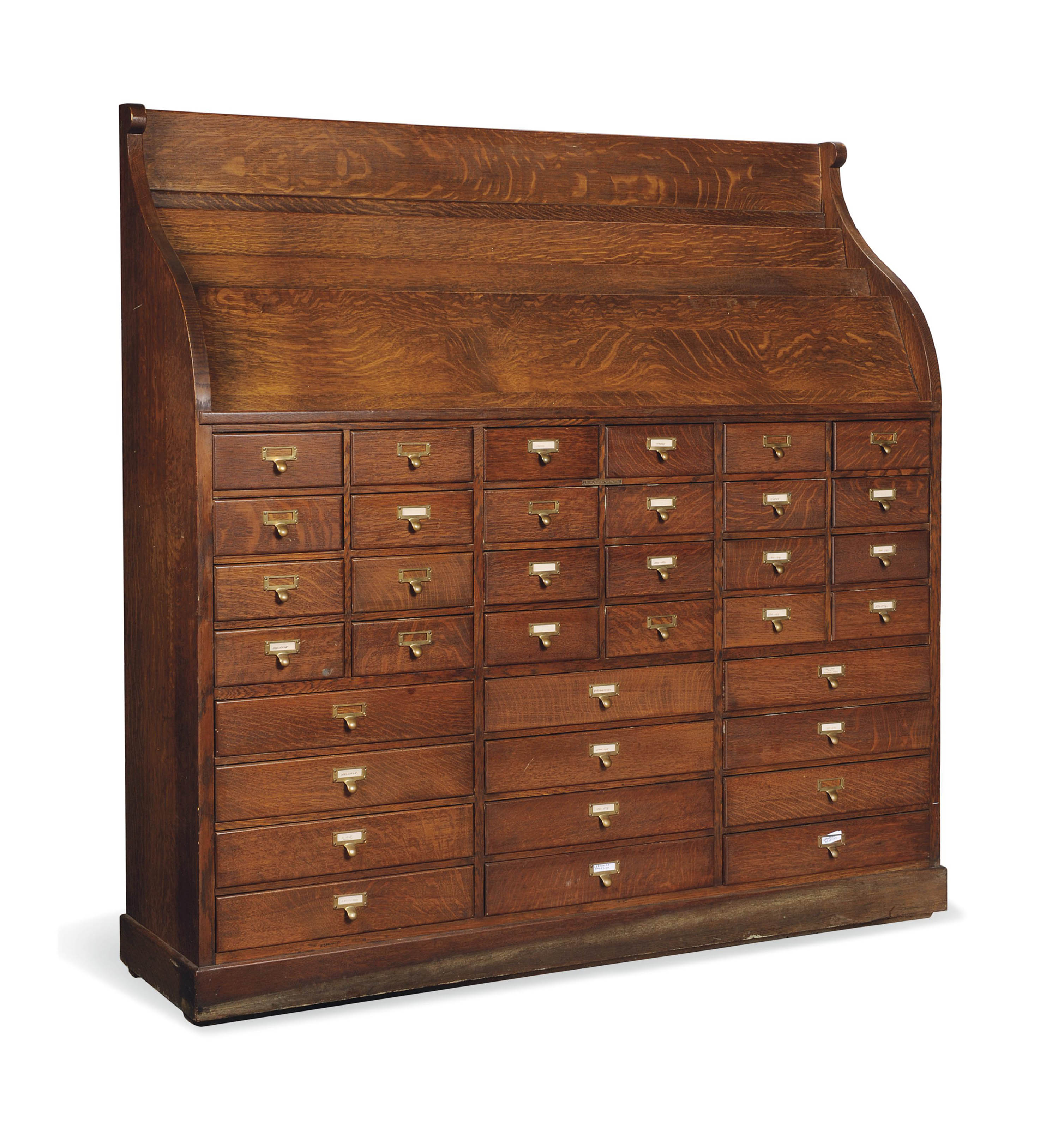 AN AMERICAN OAK LIBRARY FOLIO , BY LIBRARY BUREAU SOLE MAKERS