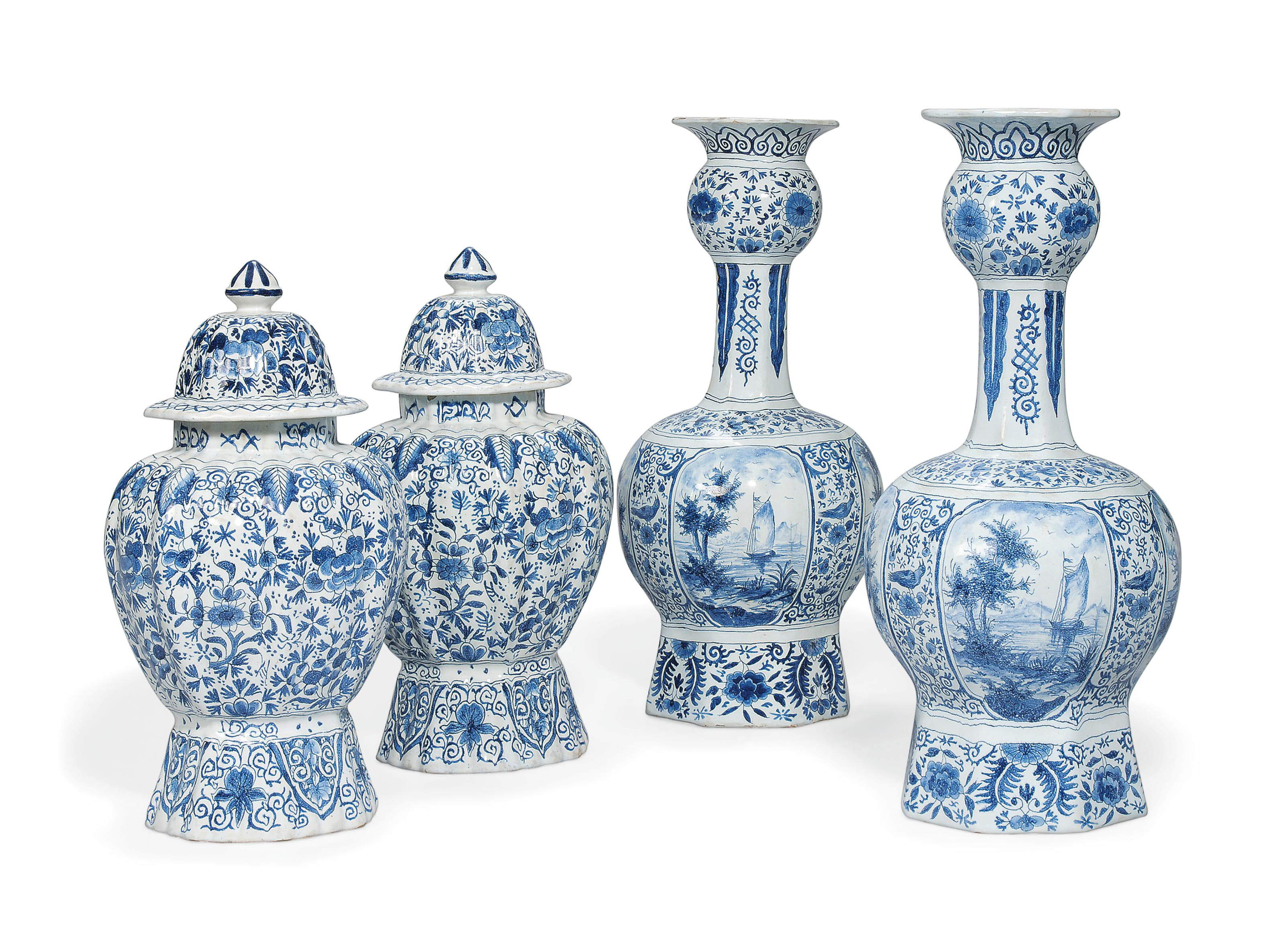 A PAIR OF DUTCH DELFT BLUE AND WHITE VASES AND COVERS AND A PAIR OF