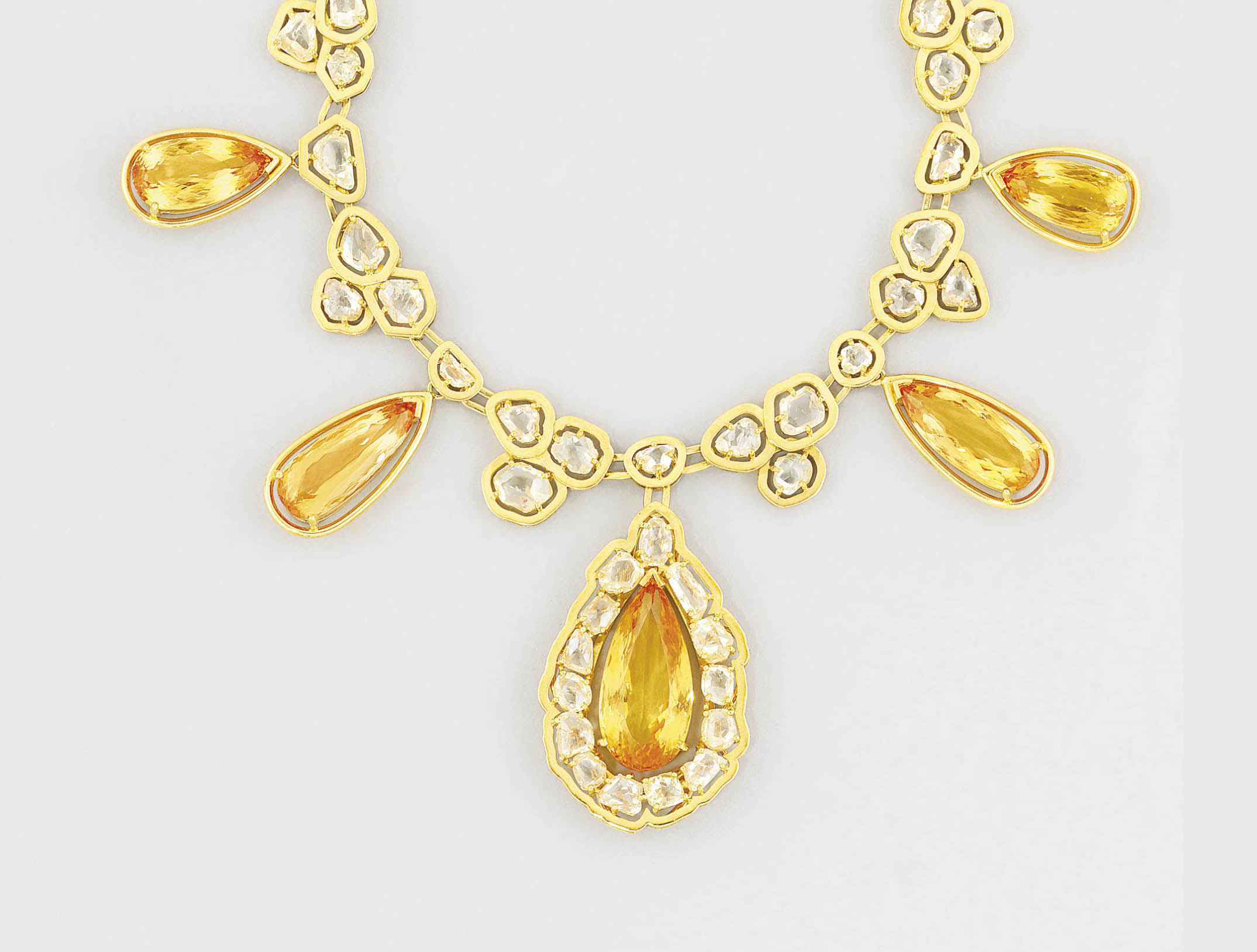 A topaz and diamond necklace and earring suite, by Amsterdam Sauer
