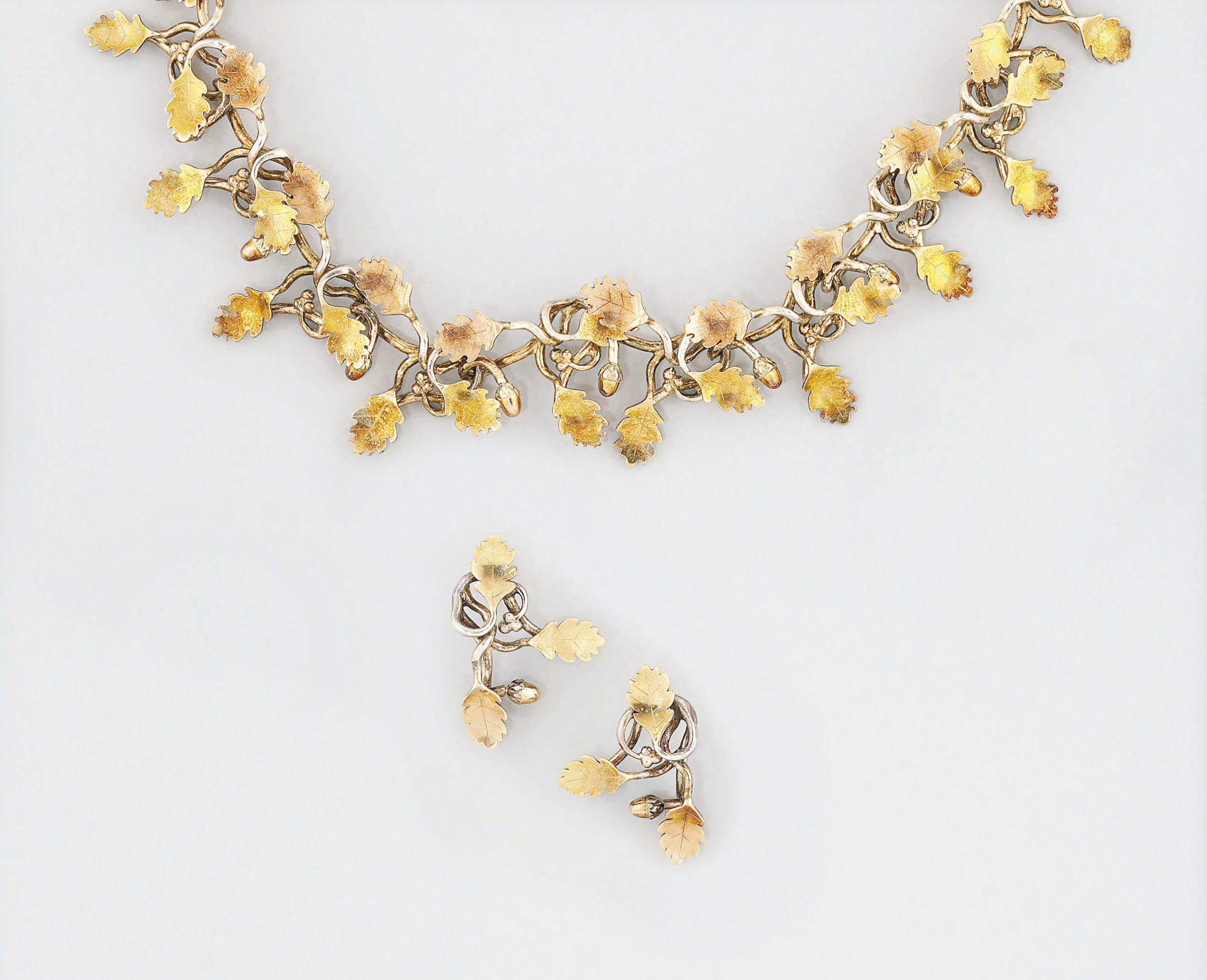 A 9ct gold and silver necklace and earrings Christie's