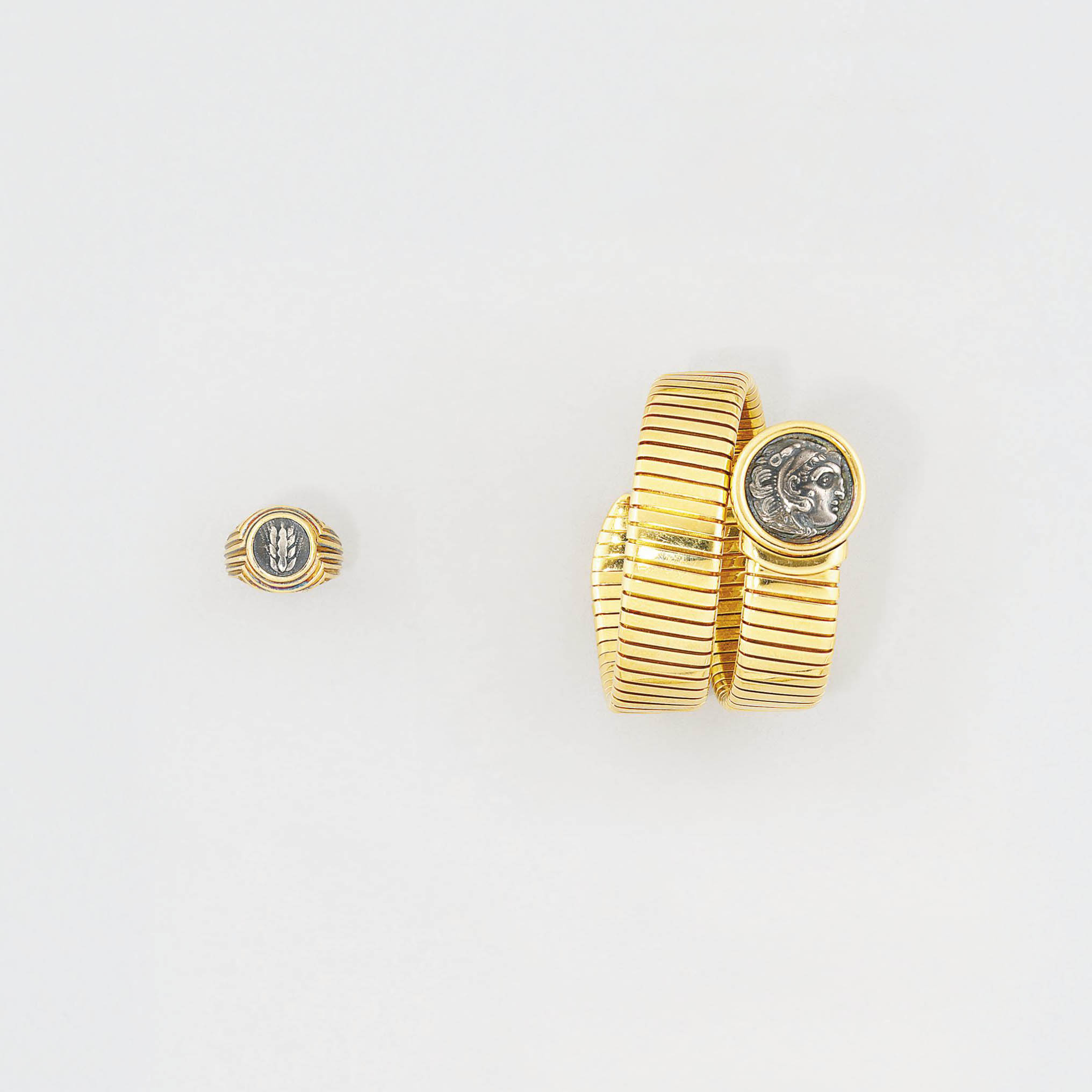 A Tubogas Coin Bracelet And A Coin Ring By Bulgari Shop our selection of bulgari rings from the world's premier auctions and galleries. tubogas coin bracelet and a coin ring
