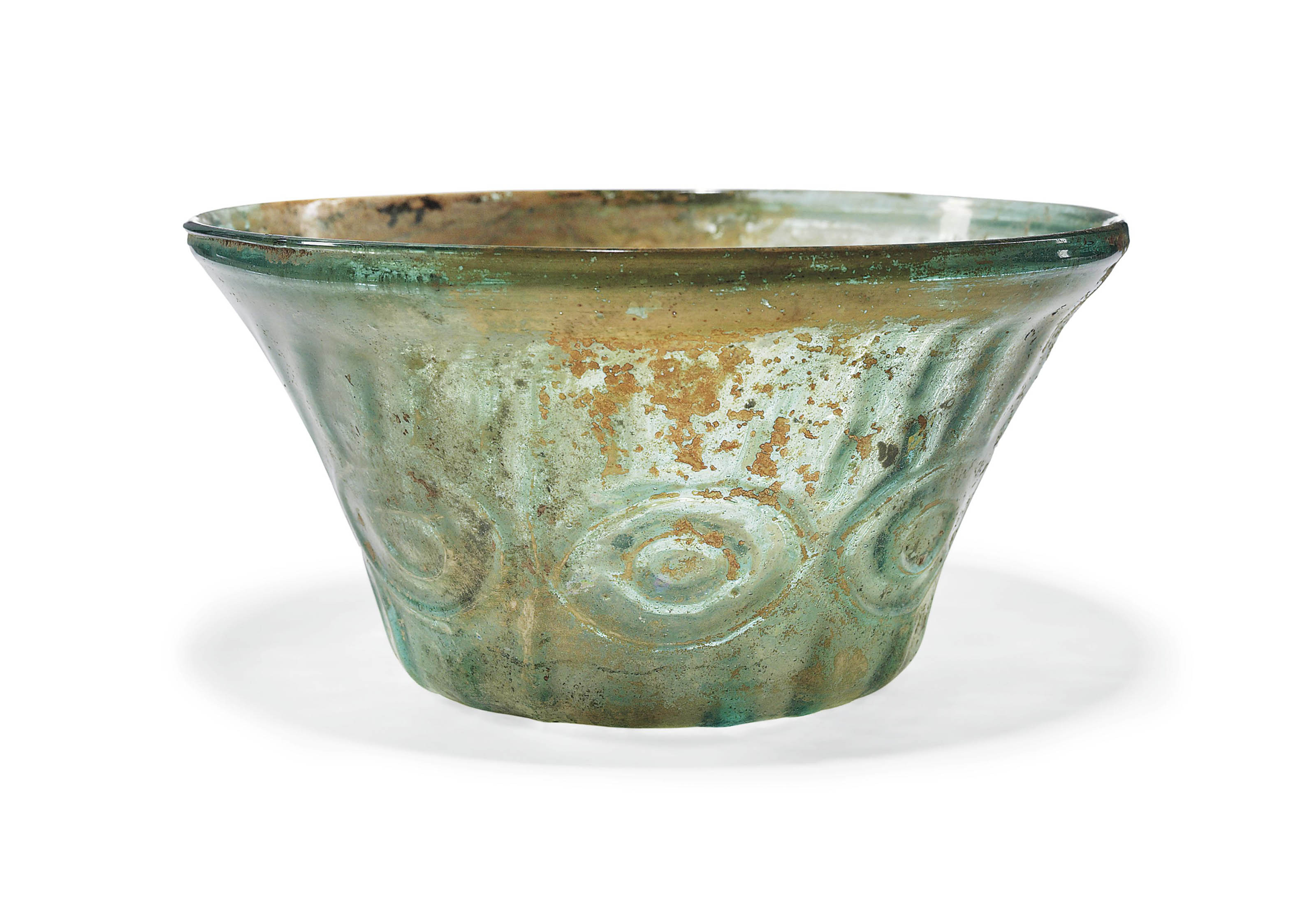 AN INTACT MOULDBLOWN GREEN GLASS BOWL , PROBABLY IRAN, CIRCA 12TH