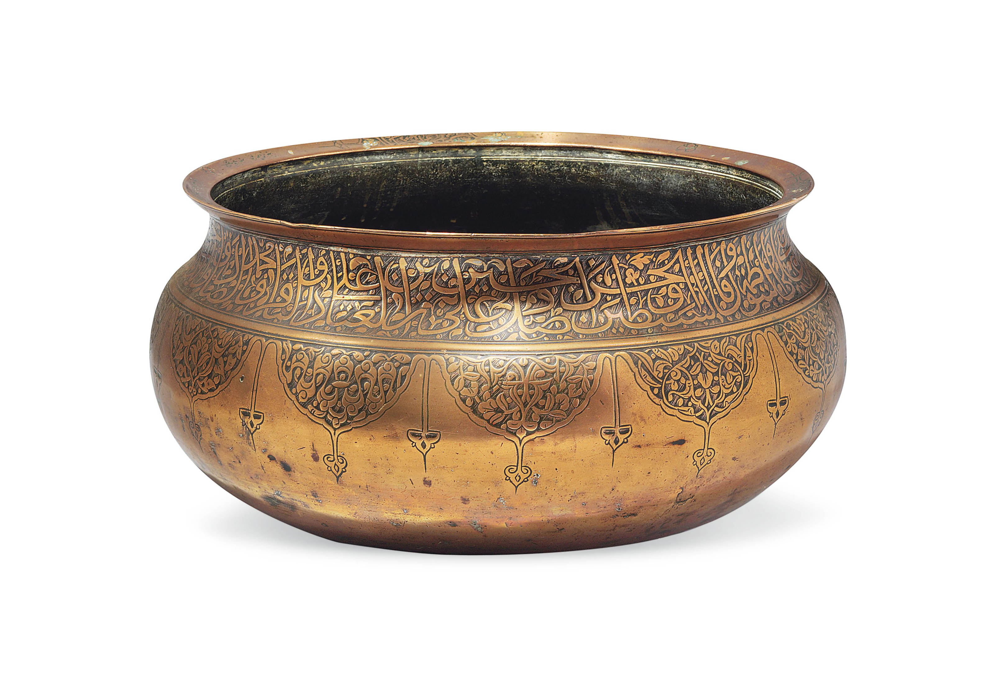 A LARGE COPPER BOWL WITH THE NAMES OF THE TWELVE IMAMS , TIMURID OR