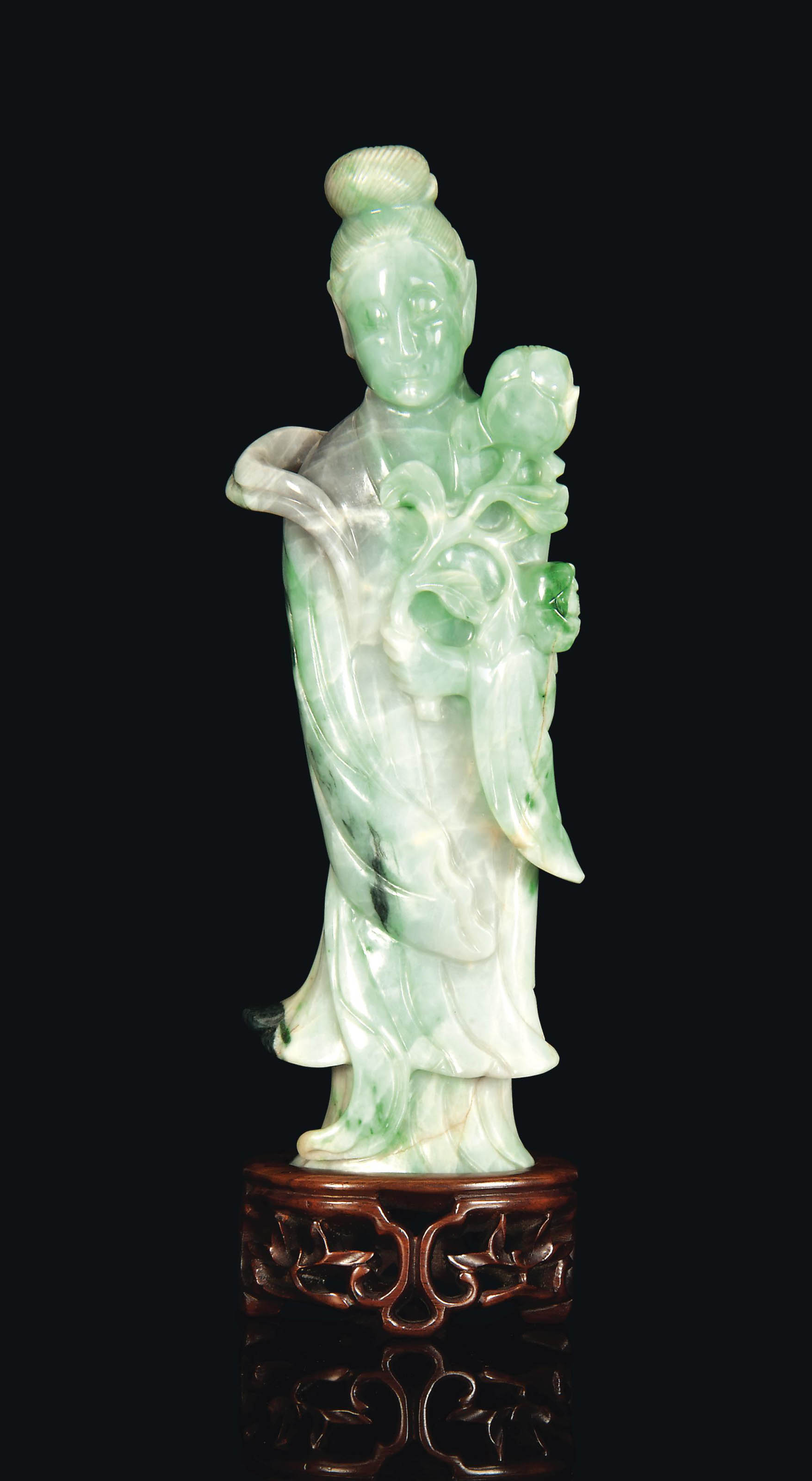 A CHINESE JADEITE FIGURE OF A FEMALE IMMORTAL , 19TH/20TH CENTURY