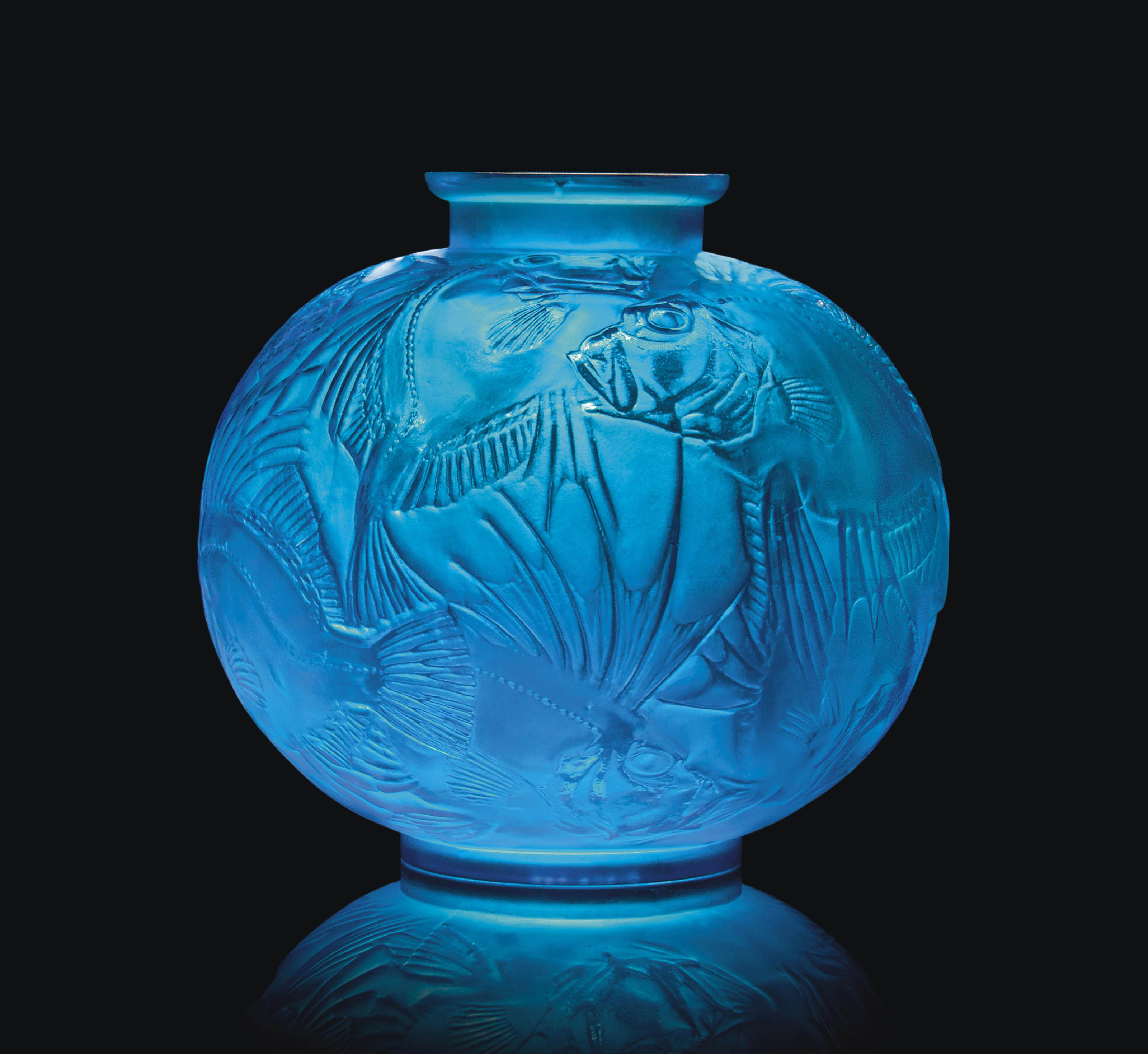A rare &lsquo;Poisson&rsquo; vase, no. 925, designed 1921. Electric blue intaglio, engraved R. Lalique, France. 24 cm high. Sold for &pound;79,250 on 31 May 2012 at Christie&rsquo;s in London