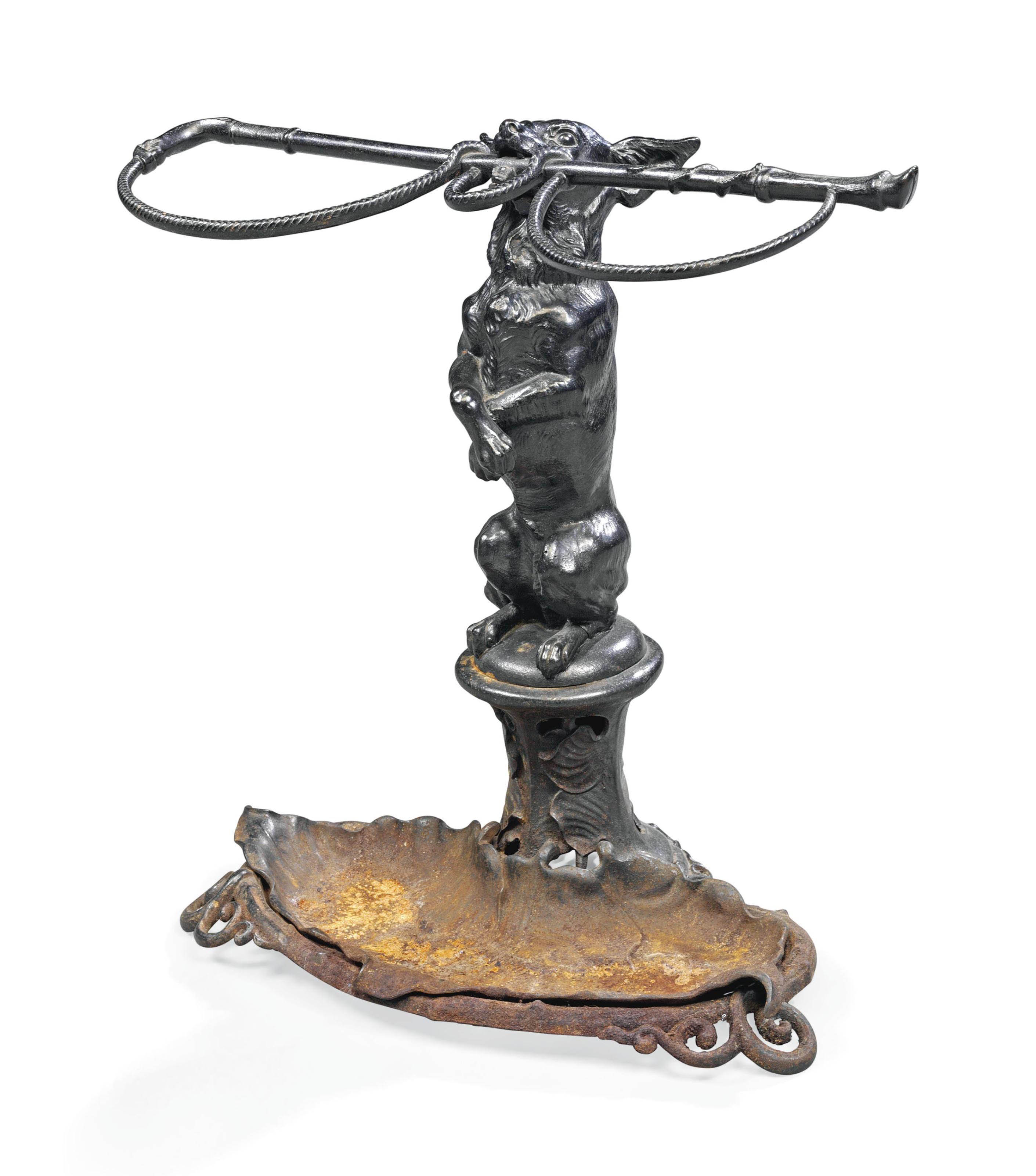 A VICTORIAN CAST IRON UMBRELLA STAND , BY COALBROOKDALE, SECOND HALF