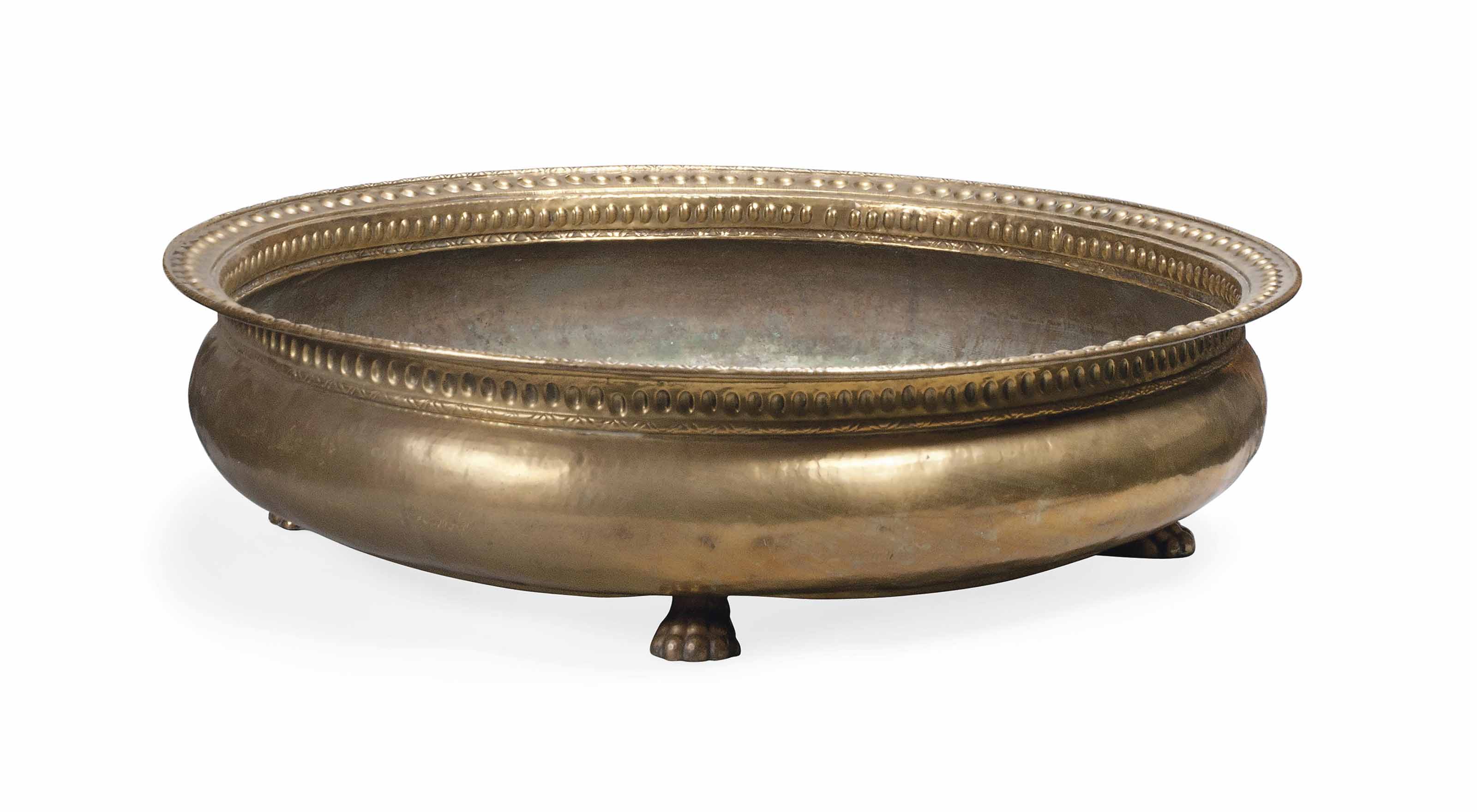 A LARGE INDIAN BRASS BOWL , LATE 19TH CENTURY Christie's