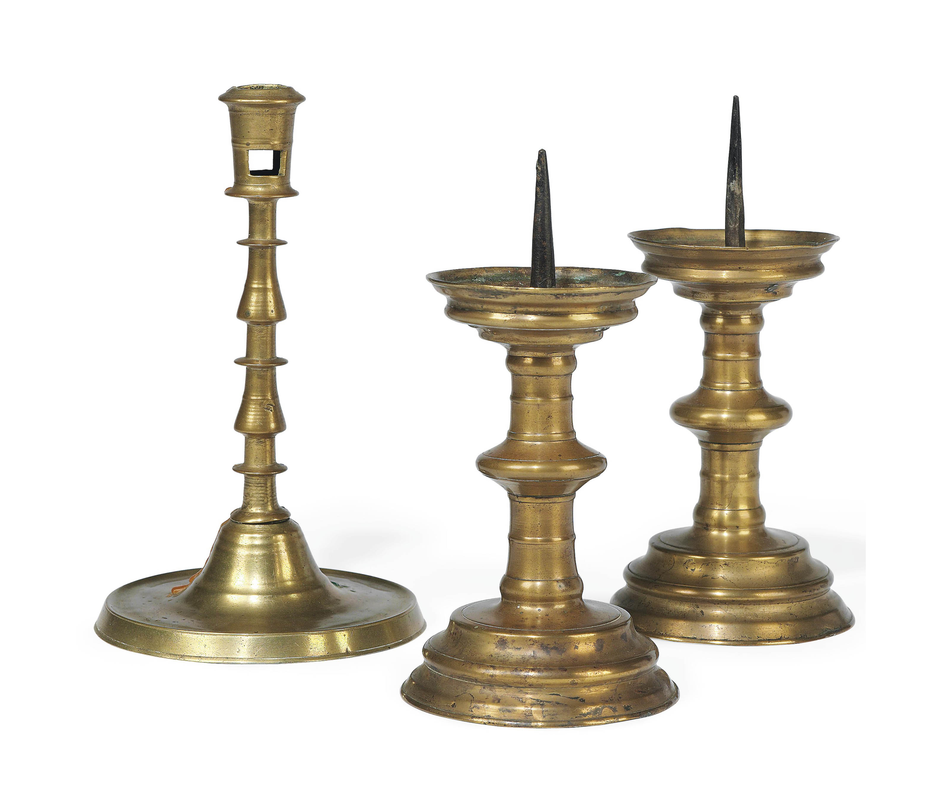 A PAIR OF GERMAN BRASS PRICKET CANDLESTICKS , 16TH CENTURY Christie's