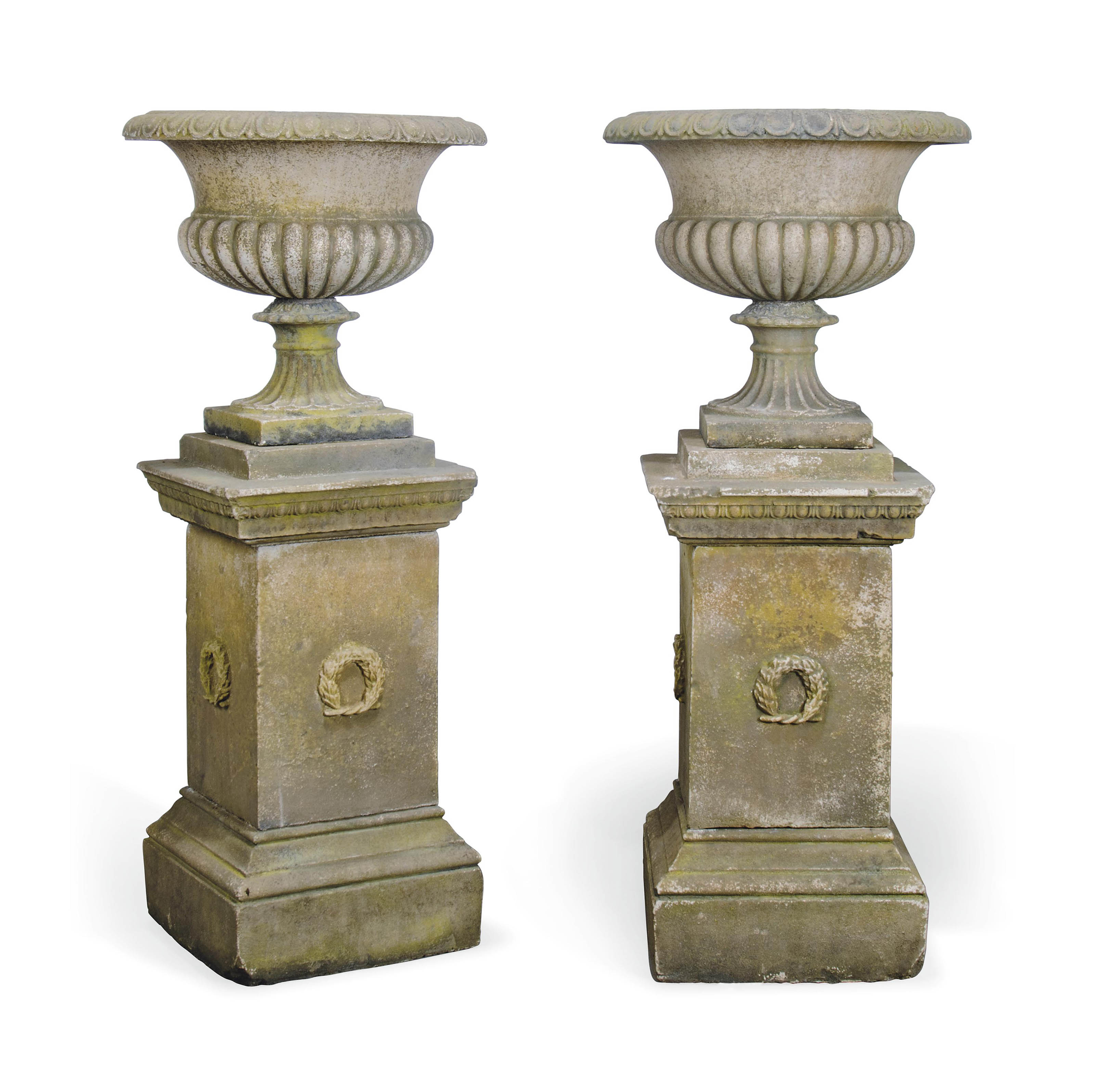 2012_CSK_06721_0402_000(a_pair_of_composite_stone_garden_urns_on_plinths_of_recent_manufacture)