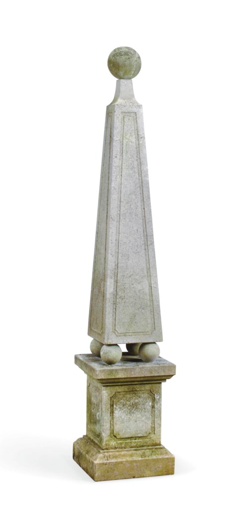 A LIMESTONE GARDEN OBELISK
