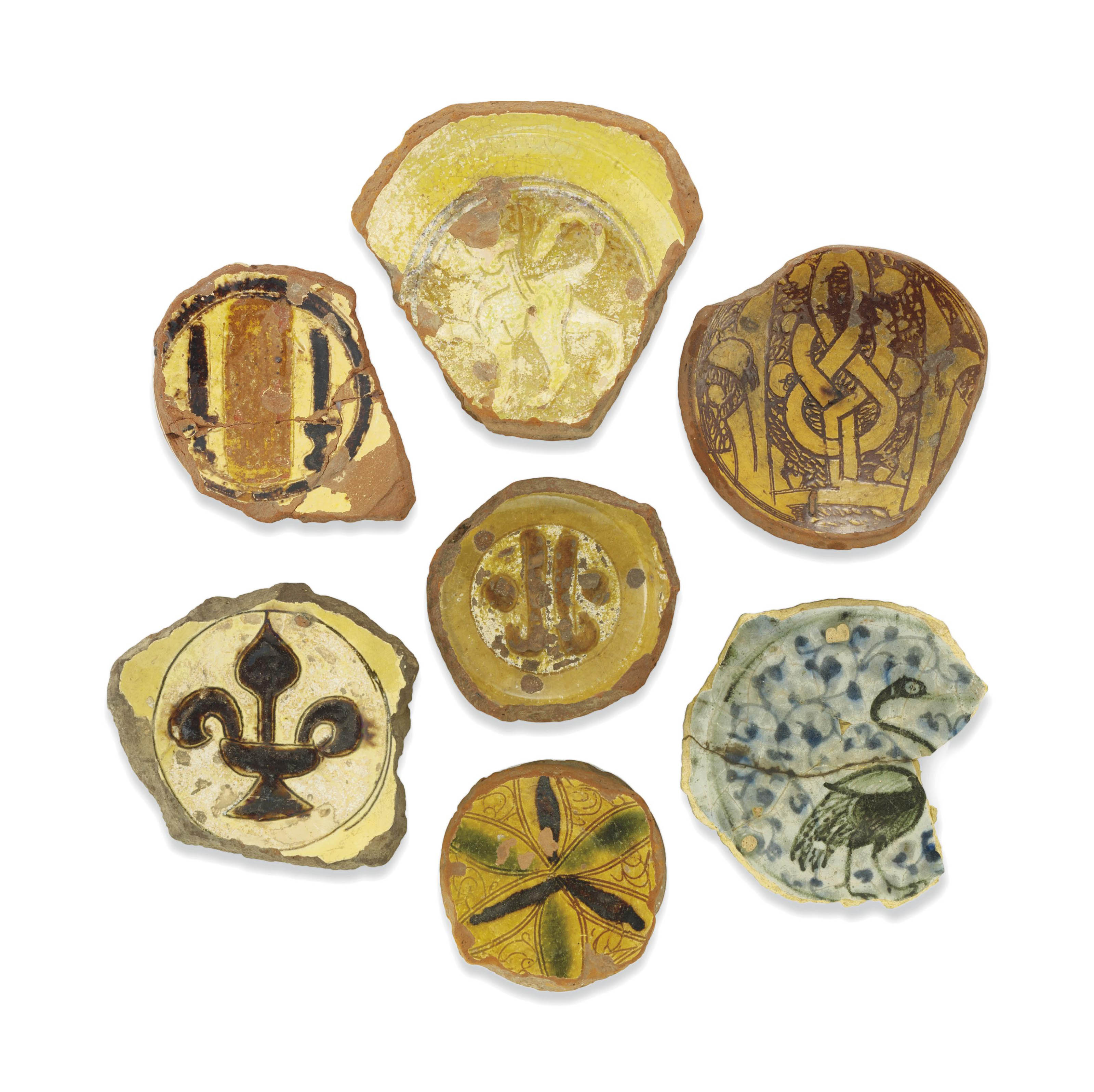 A COLLECTION OF MAMLUK POTTERY FRAGMENTS , EGYPT OR SYRIA, 14TH CENTURY