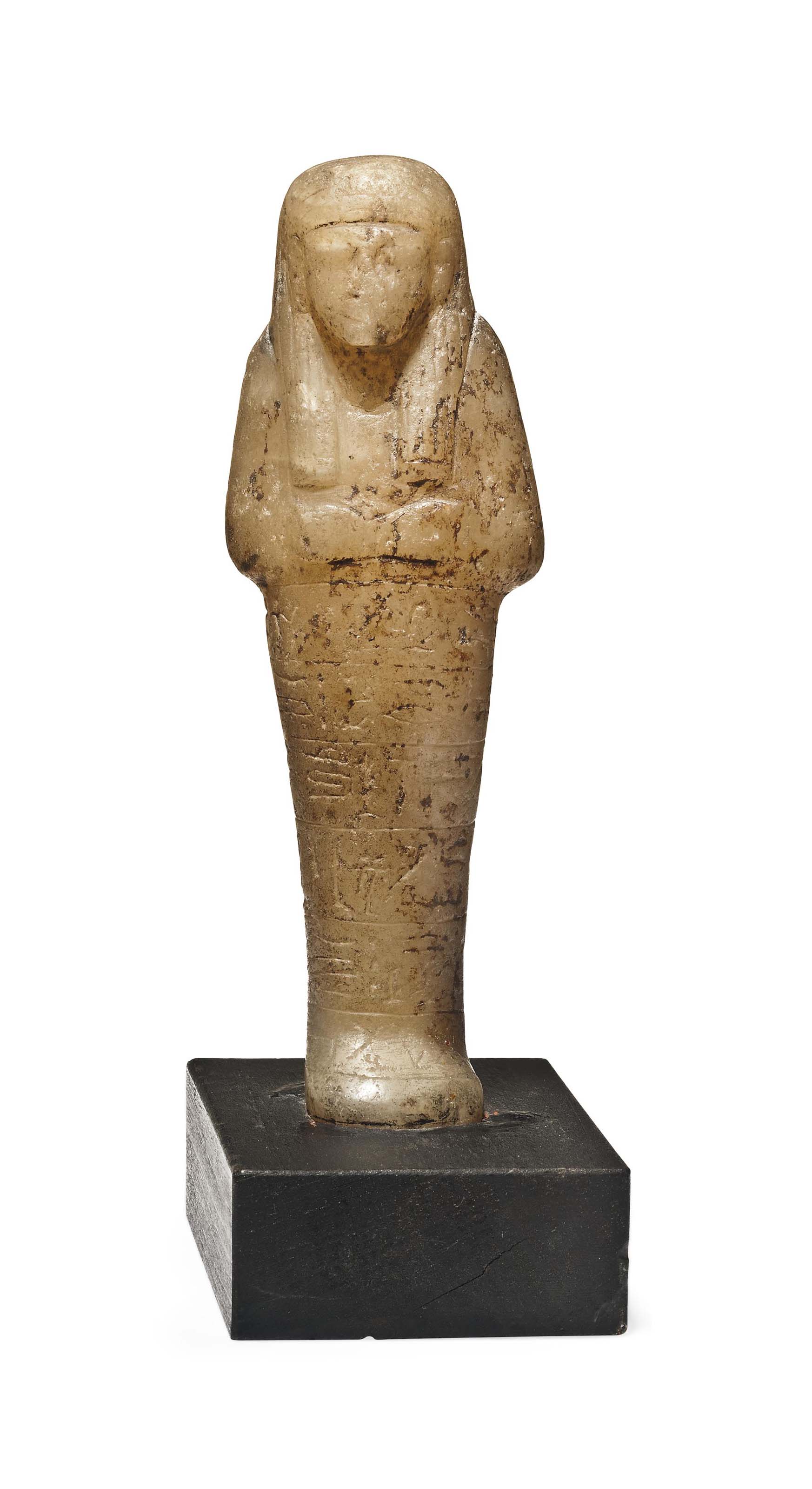 AN EGYPTIAN ALABASTER SHABTI , NEW KINGDOM, DYNASTY XIXXX, CIRCA 1292