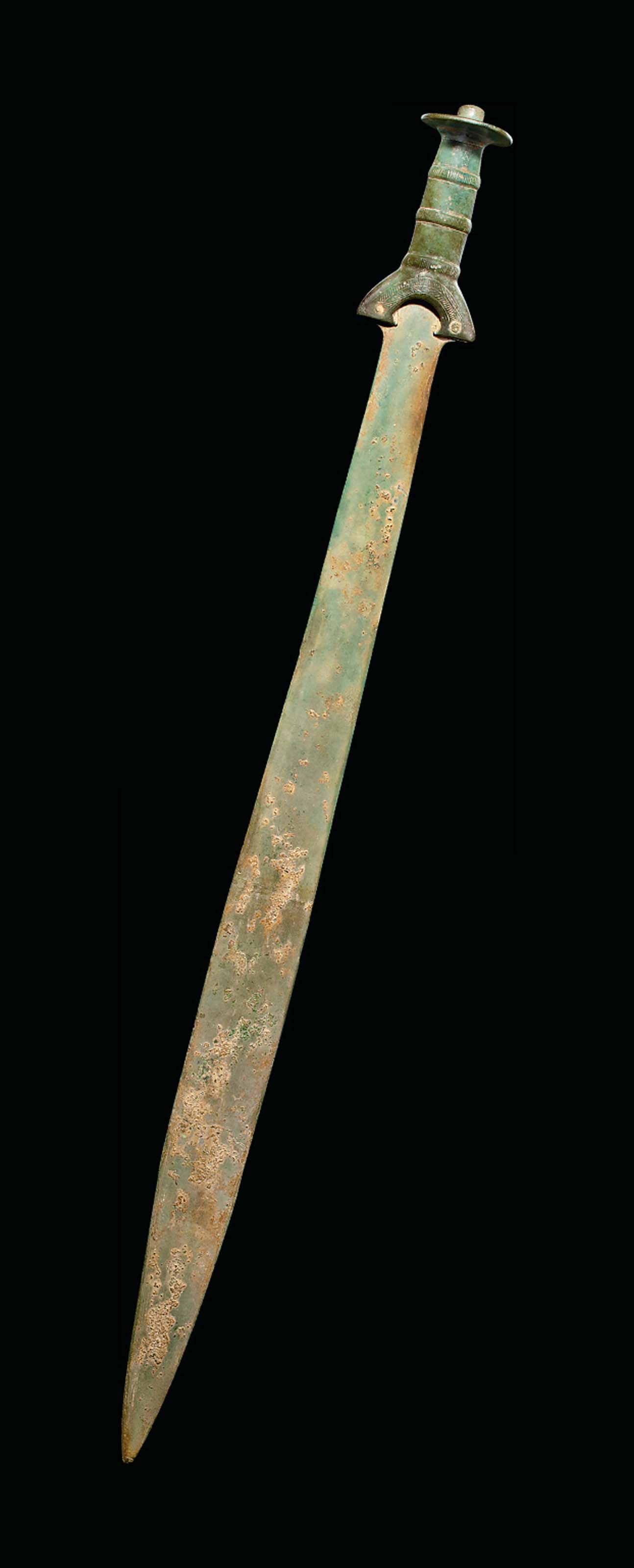 A EUROPEAN BRONZE SWORD , BRONZE AGE, CIRCA 12TH10TH CENTURY B.C